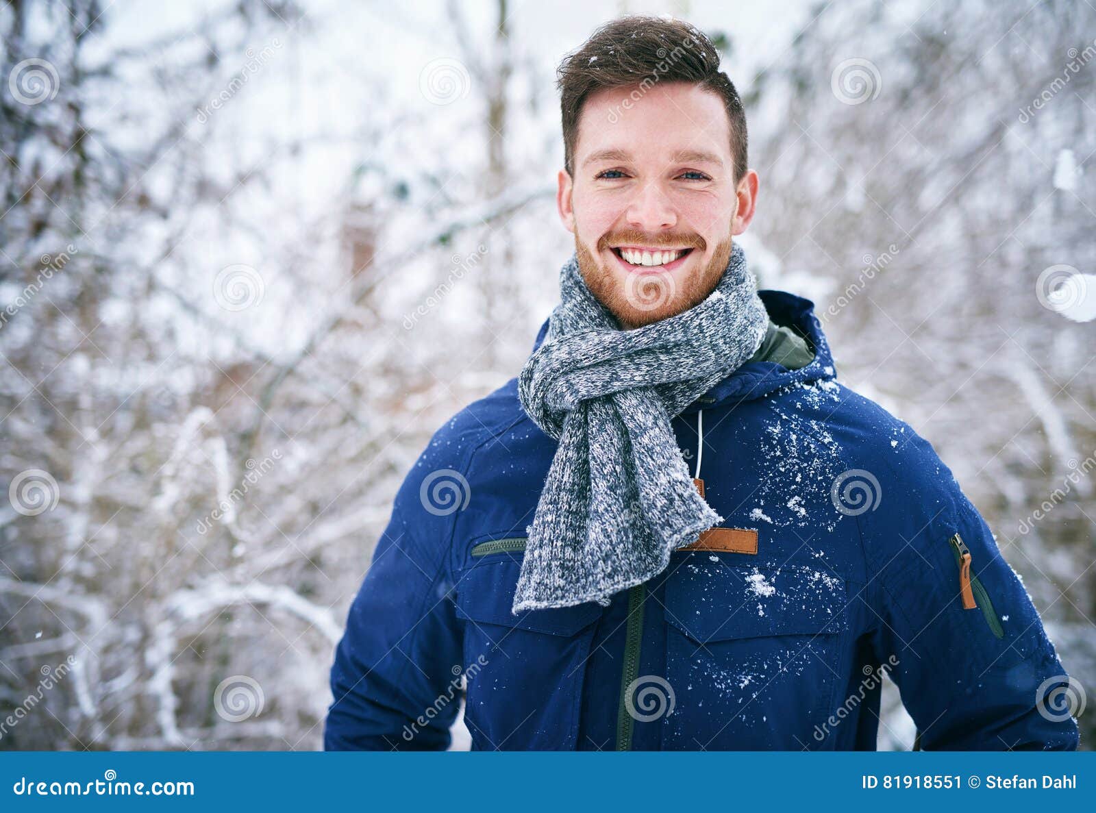 Young Man in Coat Standing in Snowfall Stock Image - Image of looking ...