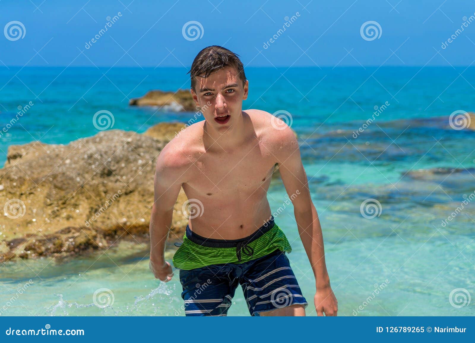 Young Man Coming Out of the Ocean Stock Image - Image of smart, body ...