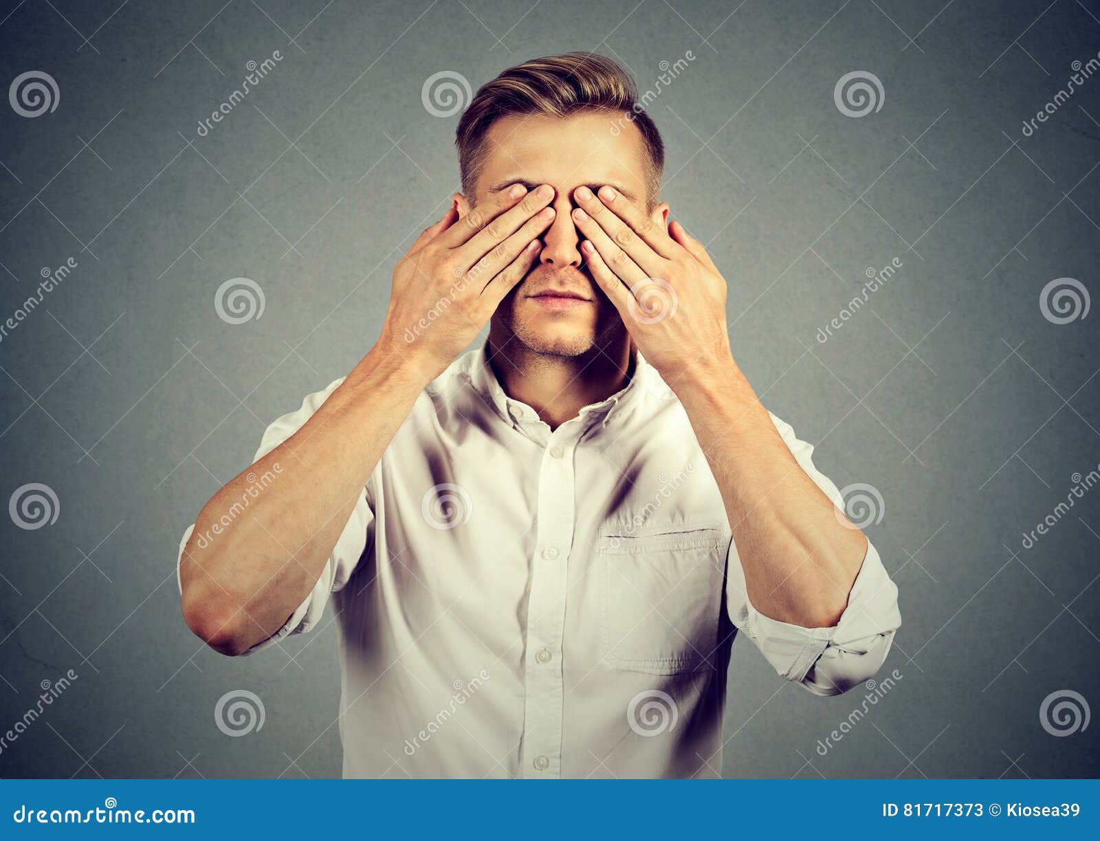 Young Man Covering Eyes with Both Hands Stock Image Image of studio