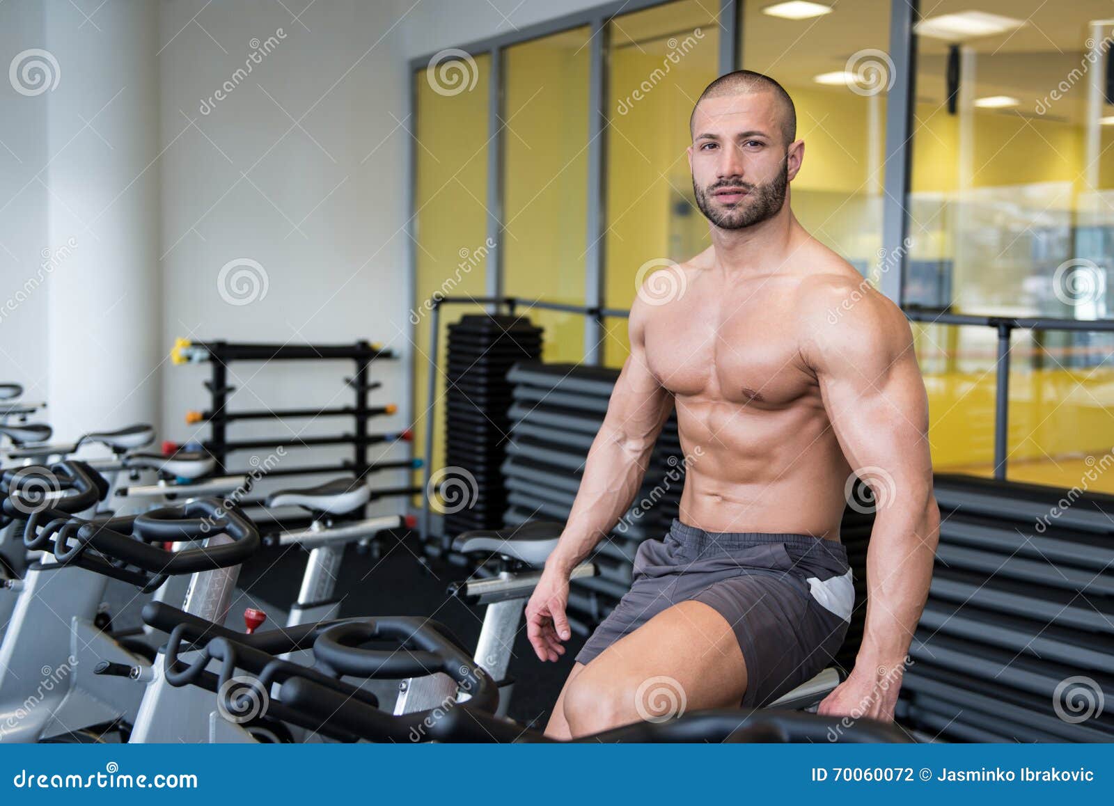 Young Man Cycling On Bike Bodybuilding Trainer Stock Photo Image regarding Cycling And Bodybuilding