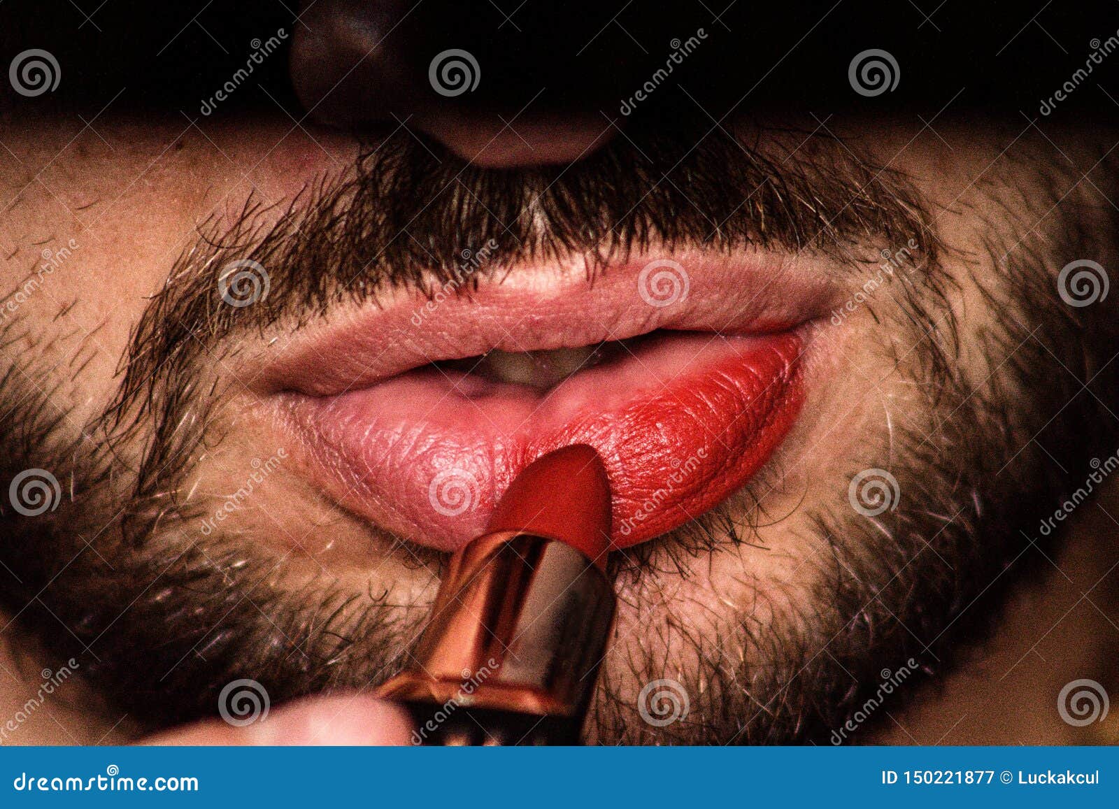 The Man With Pretty Lips A Young Man Depicts His Lips with Red Lipstick. Stock Image - Image of