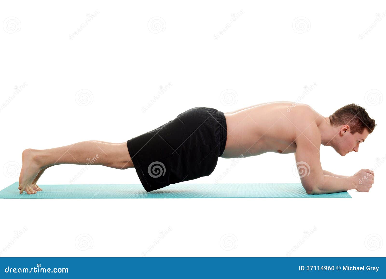 young man doing planking exercise