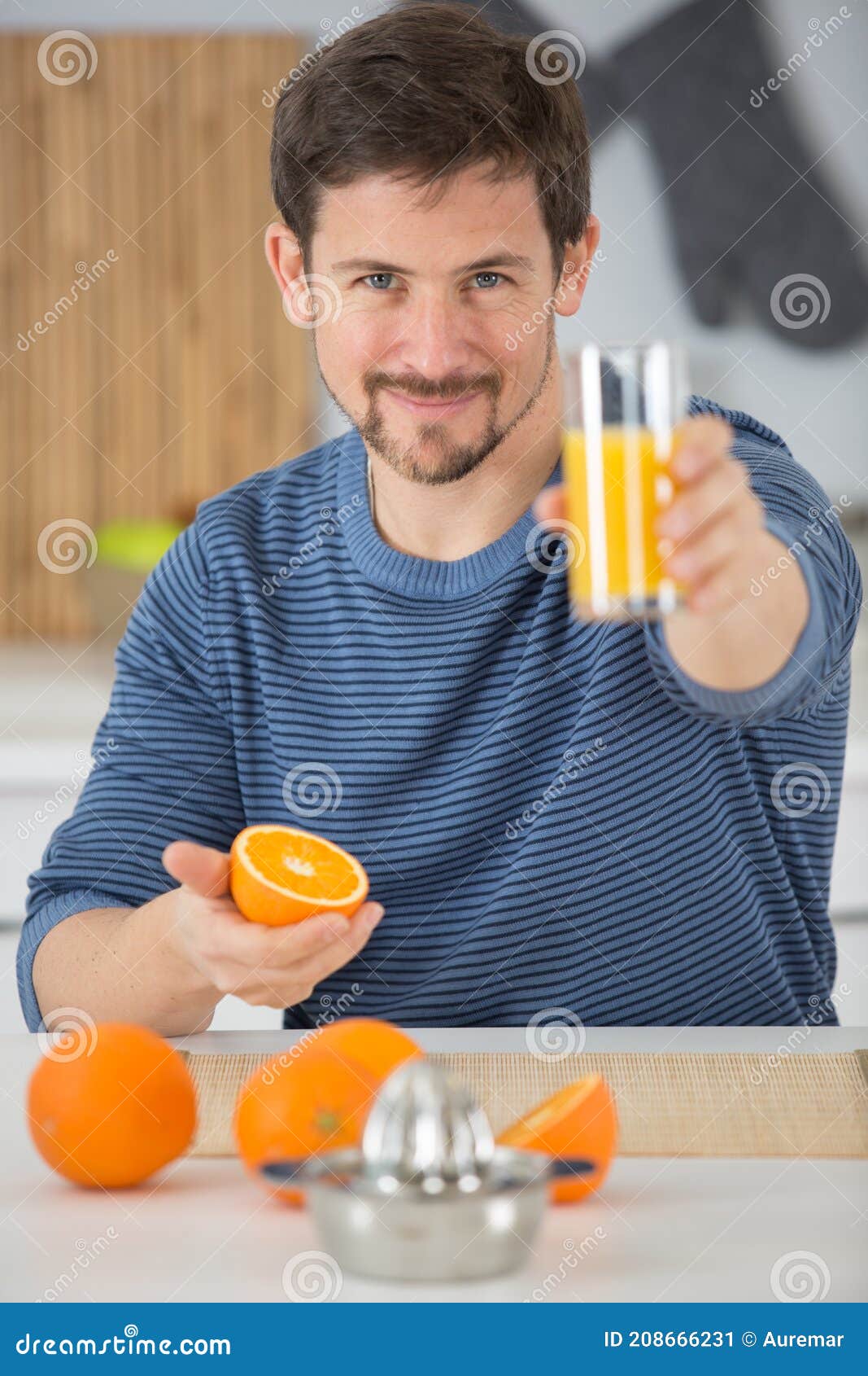 Young Man Drinking Orange Juice Stock Image - Image of skin, food ...
