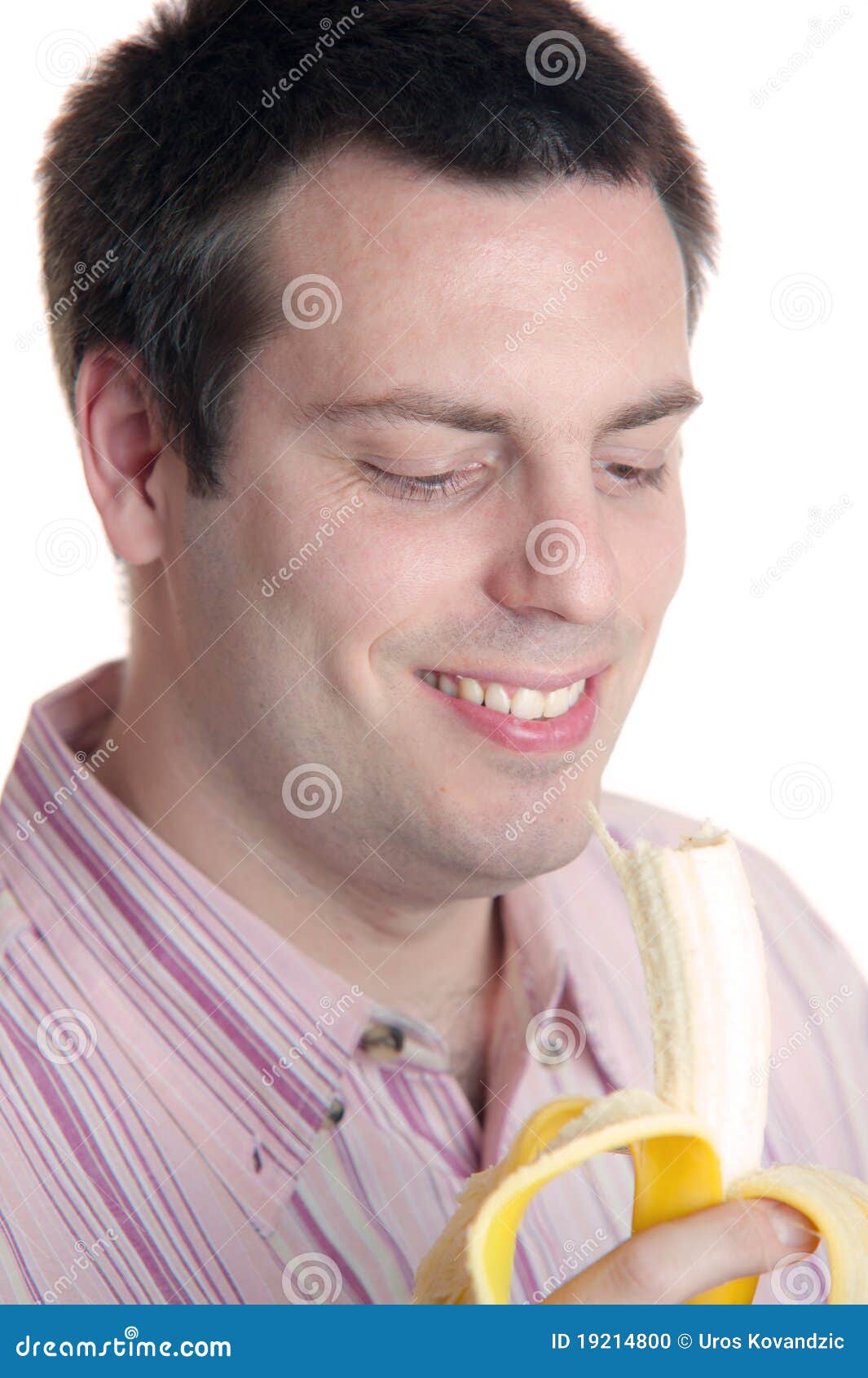 Young man eating banana stock photo. Image of young, portrait 19214800