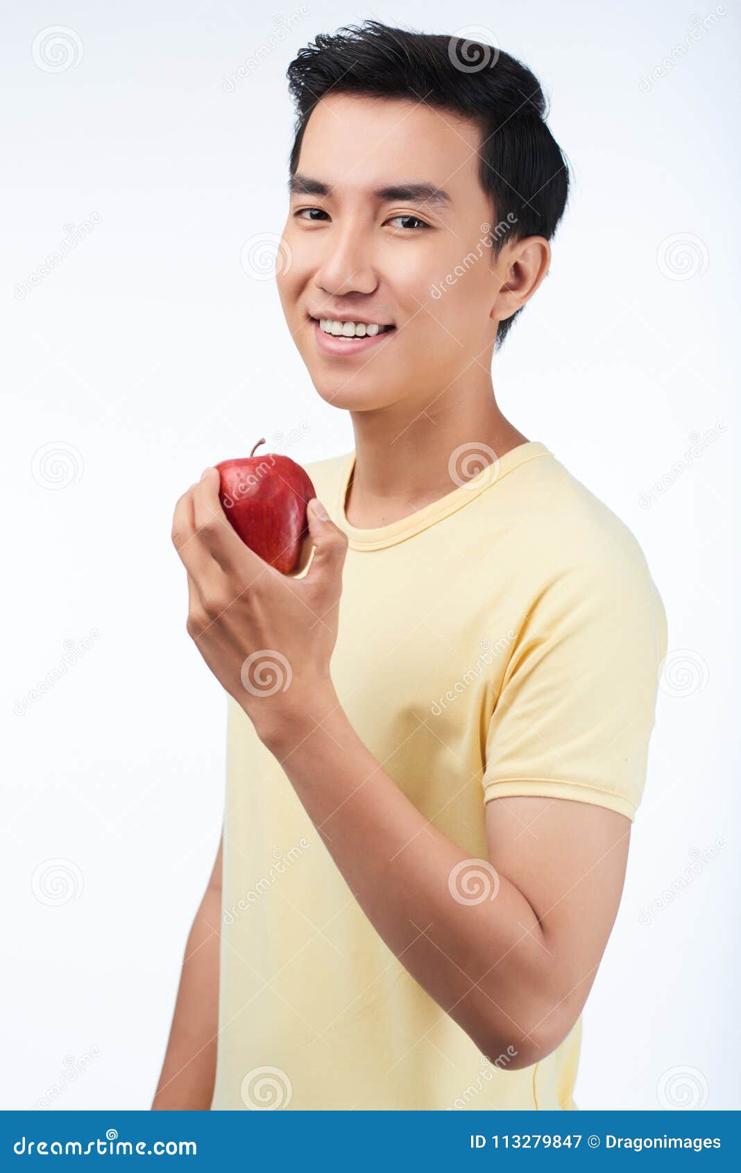 Young Man Enjoying Tasty Apple Stock Image - Image of adult, toothy ...