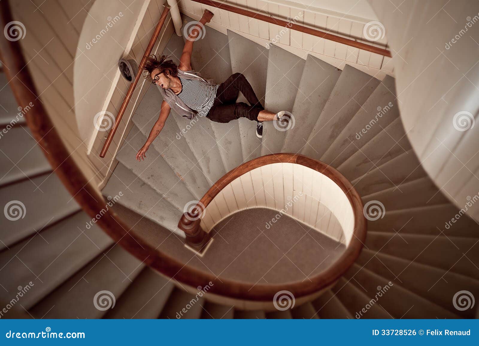 young man falling down the steep stairs