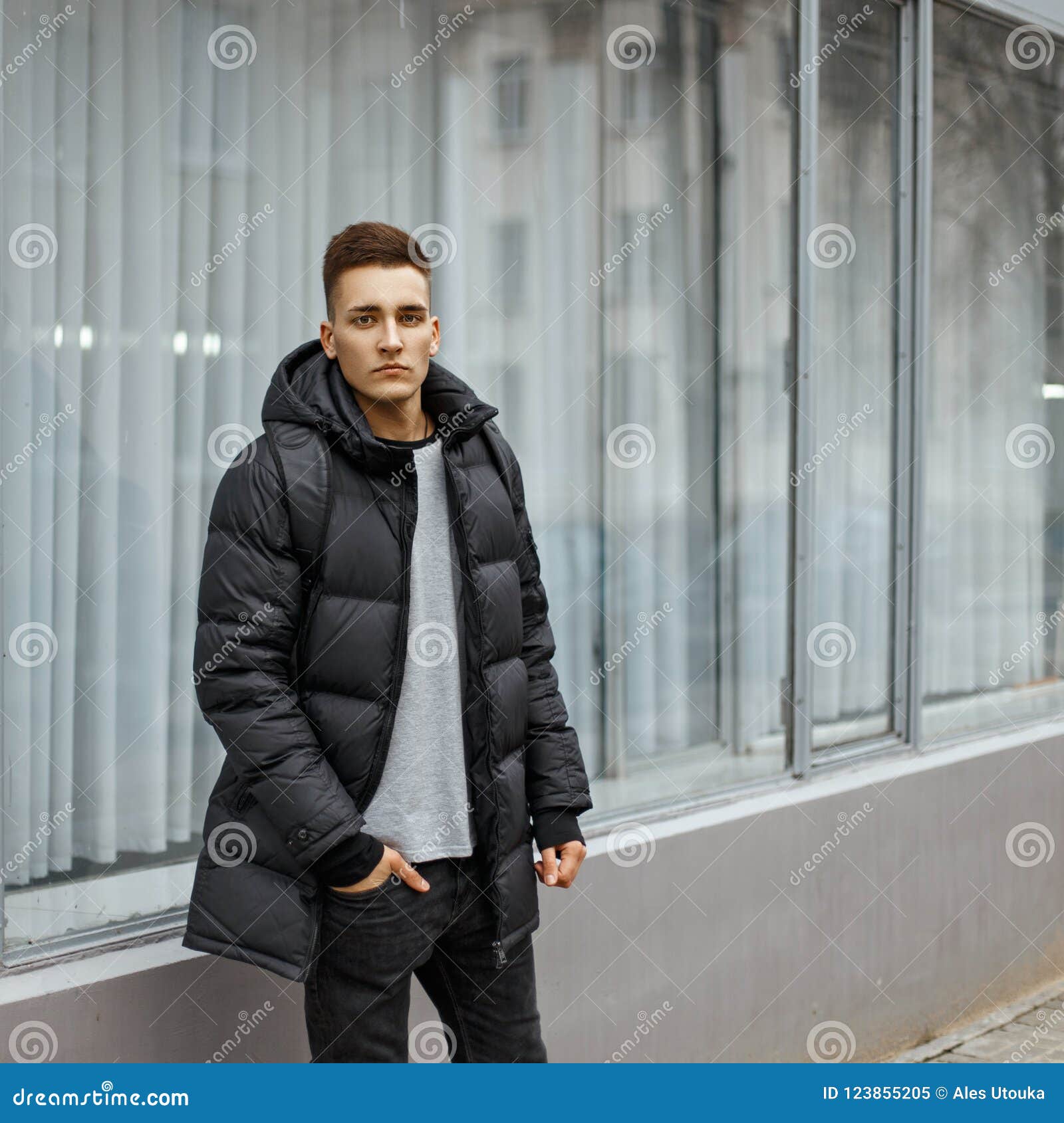 Young Man with a Fashionable Winter Jacket Posing Near Stock Image ...