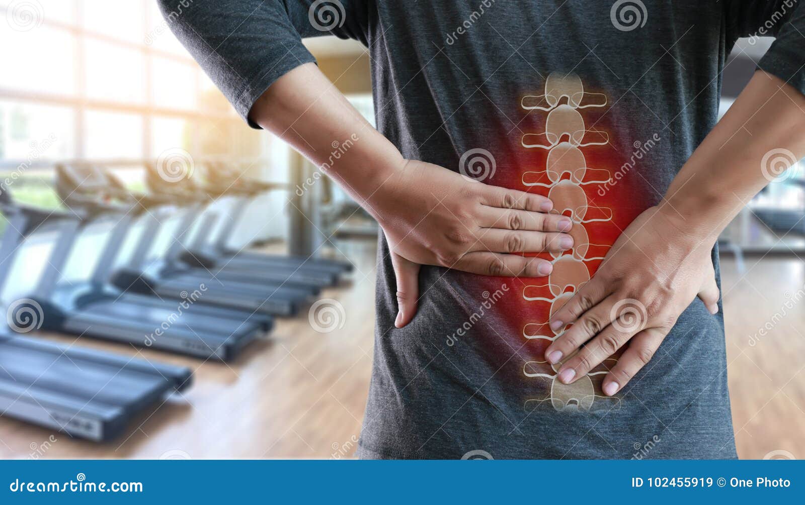 young man feeling suffering lower back pain pain relief concep