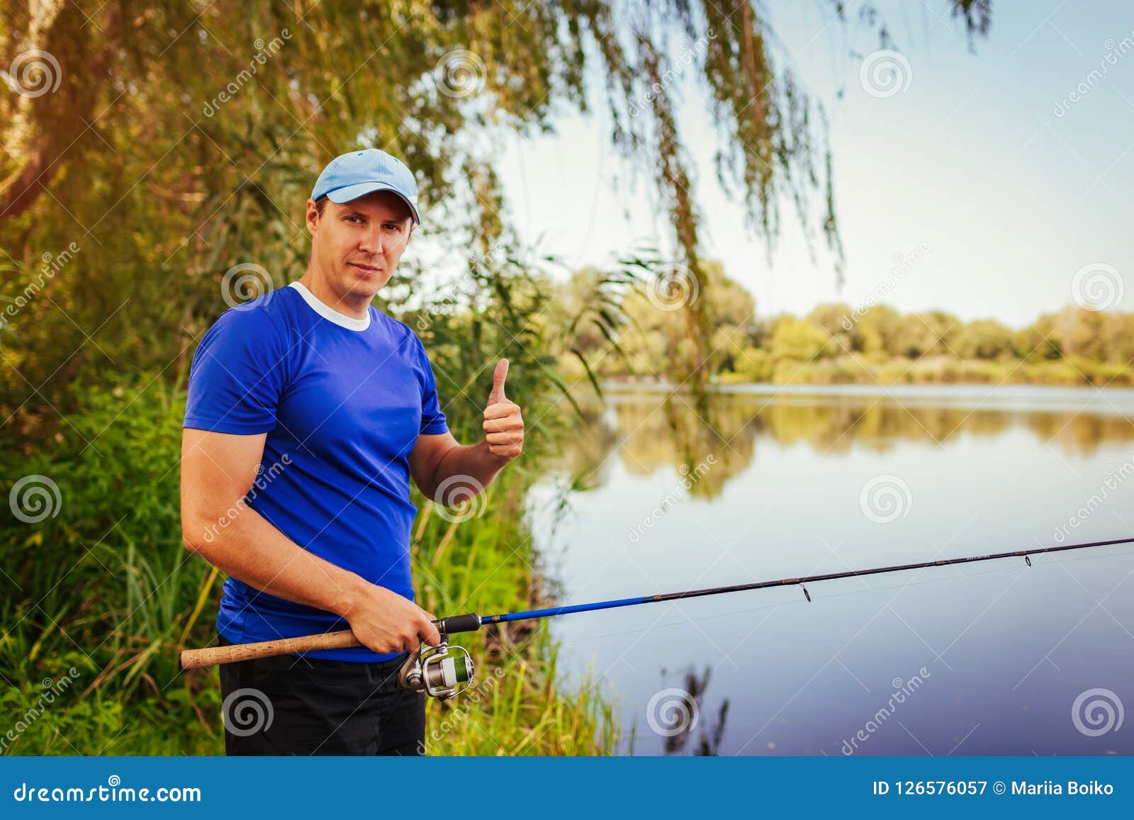 Young Man Fishing on River. Happy Fiserman Showing Thumb Up. Hobby Concept  Stock Image - Image of catch, lifestyle: 126576057