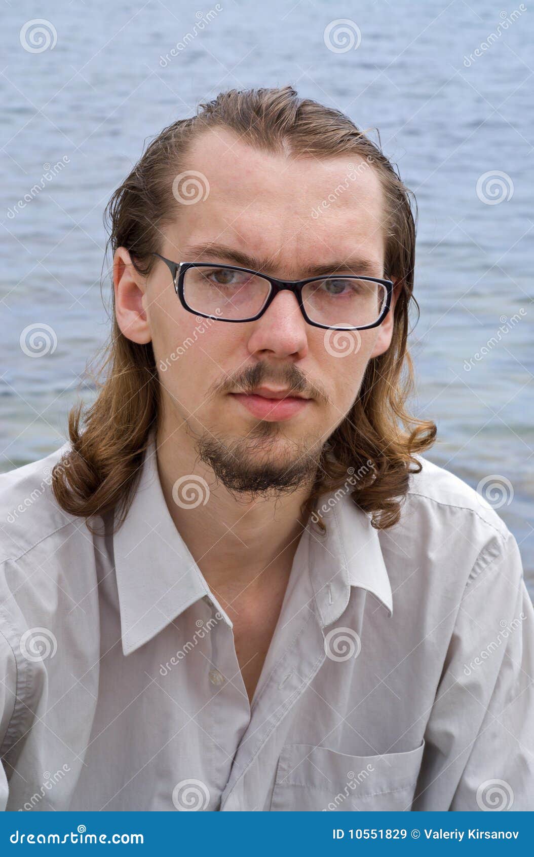 Young Man in Glasses 2 stock image. Image of hair, close 10551829