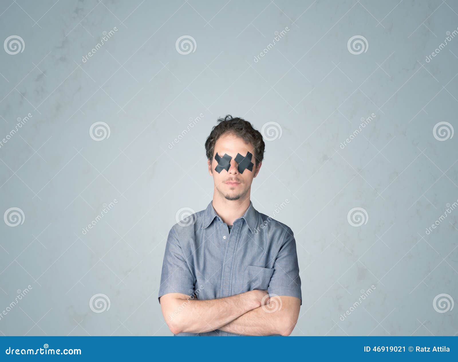 Young man with glued eye stock image. Image of attitude 46919021