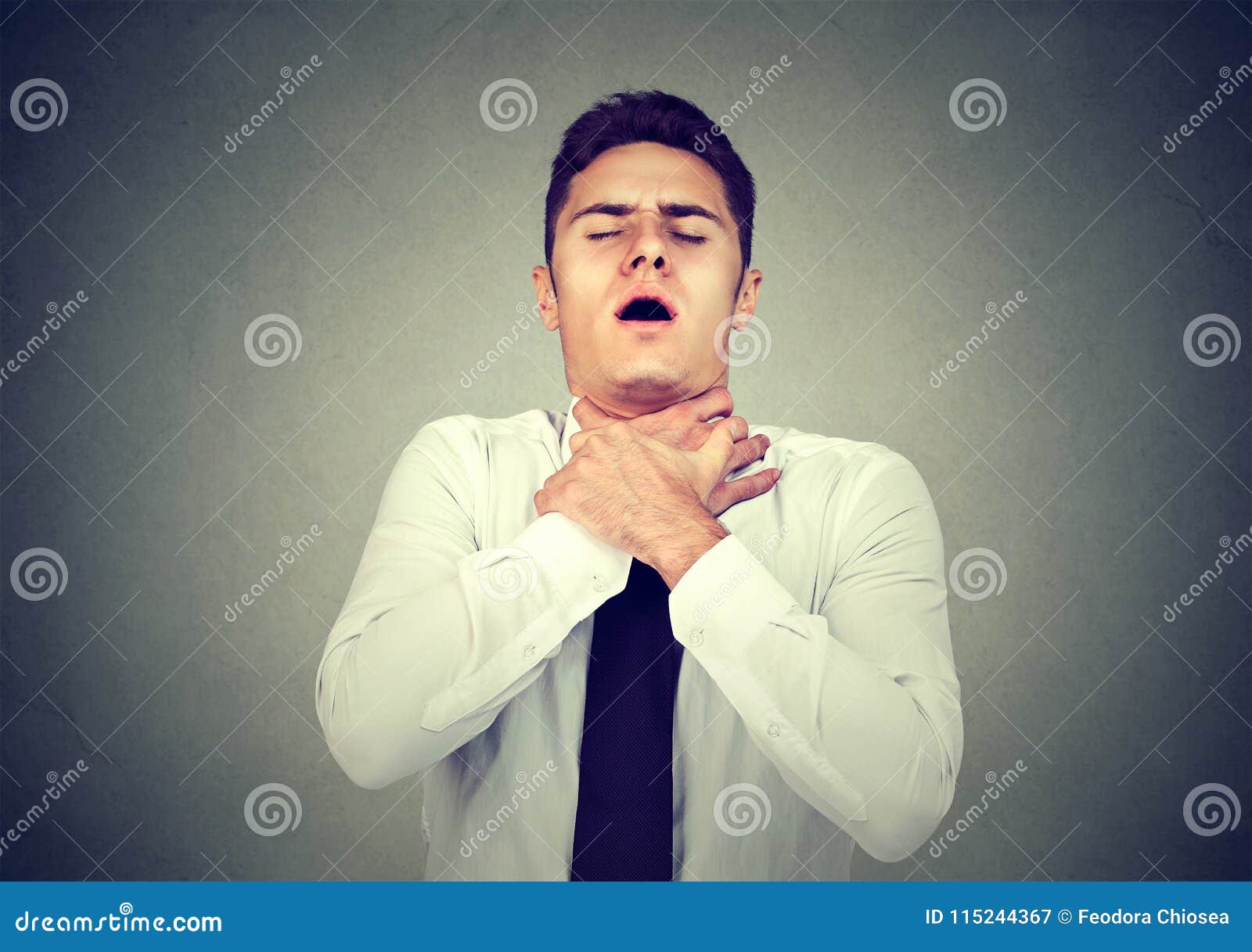 Young Man Having Asthma Attack or Choking Can`t Breath Suffering from