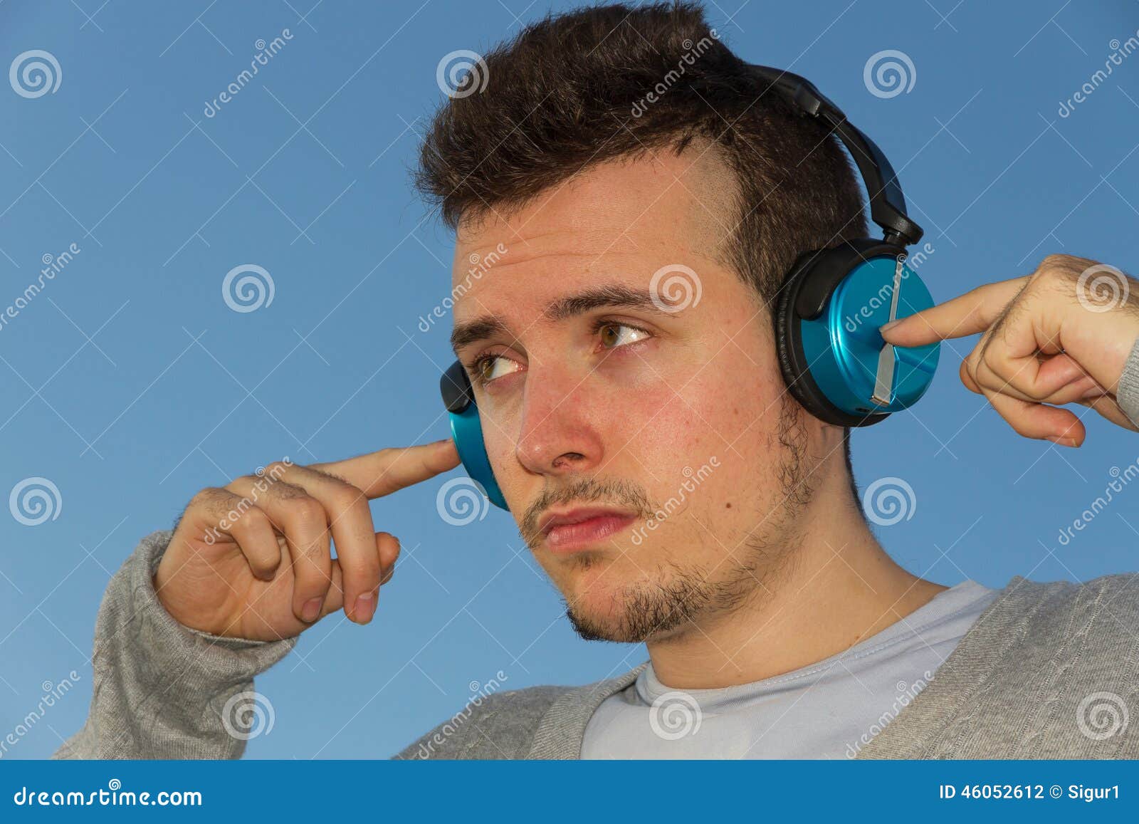 young man with headphones music