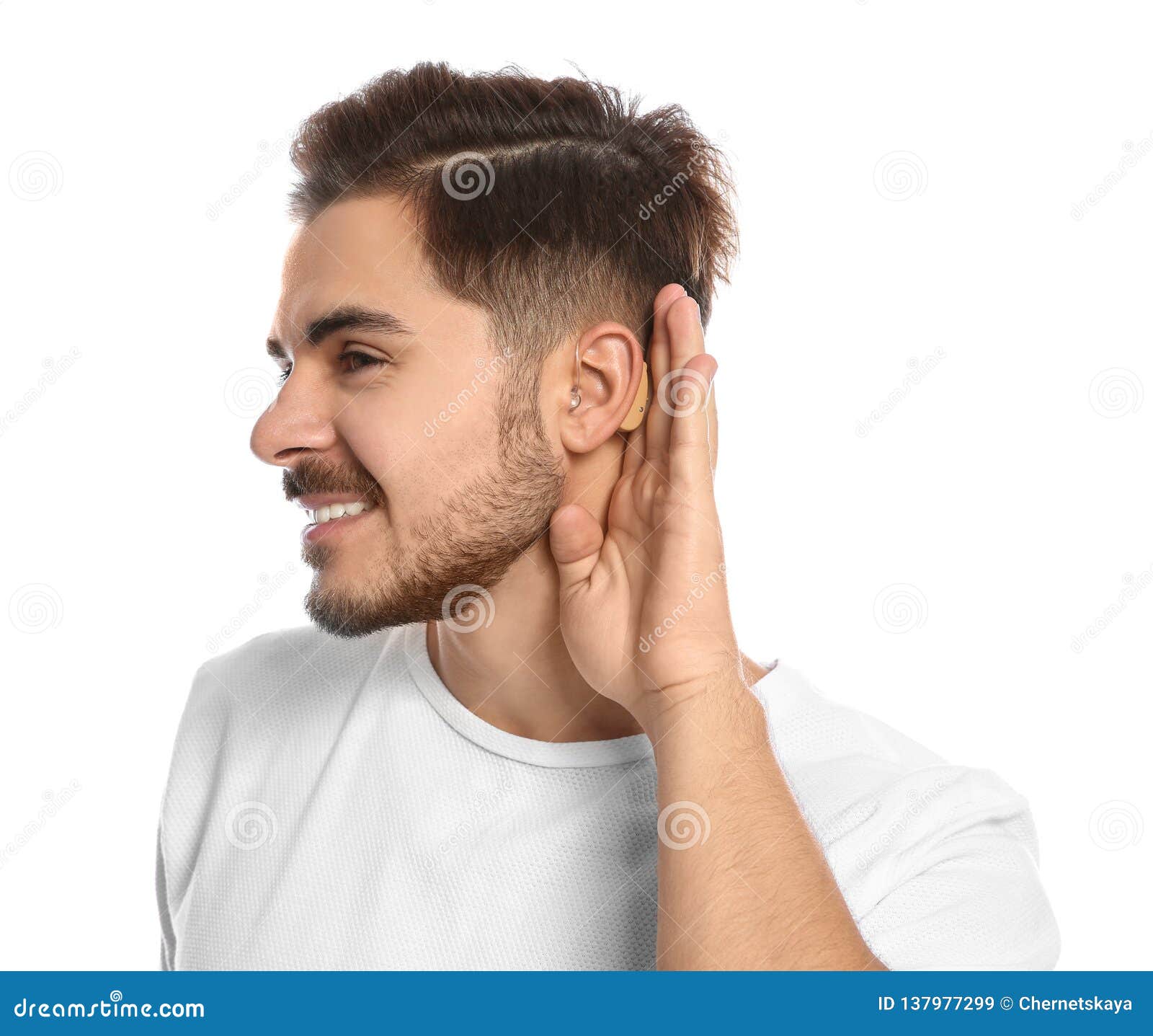 Young man with hearing aid stock image. Image of hear 137977299