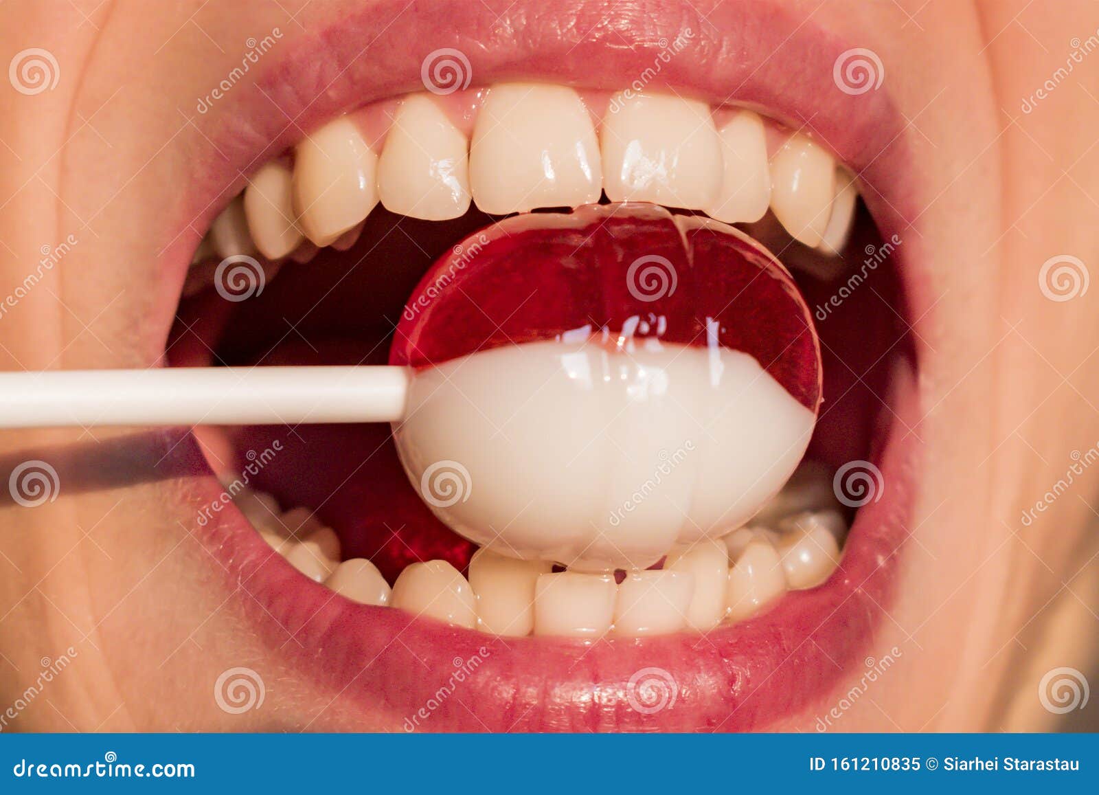 A Young Man Holds a Candy in His Teeth Stock Image Image of happy