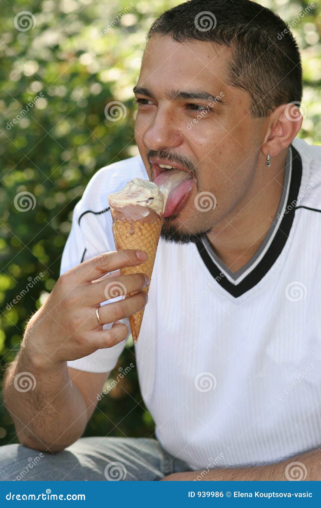 Young man with ice cream stock photo. Image of store, vocation 939986