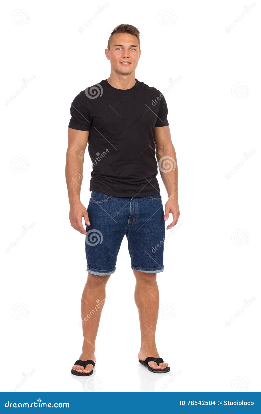 Download Young Man In Jeans Shorts, Black T-Shirt And Sandals Stock ...