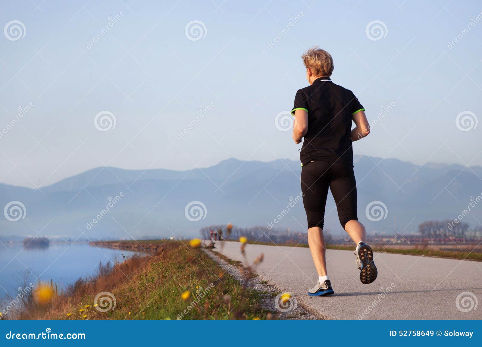 Young Man Jogging Near the Lake Stock Image Image of male, fitness