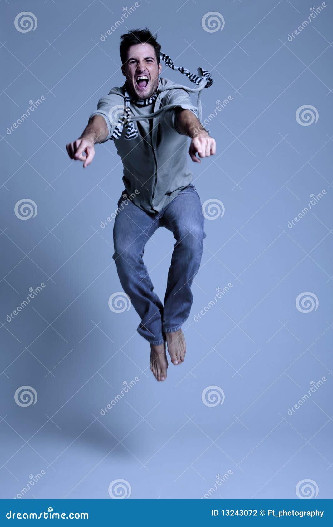 young man jumping in excitement