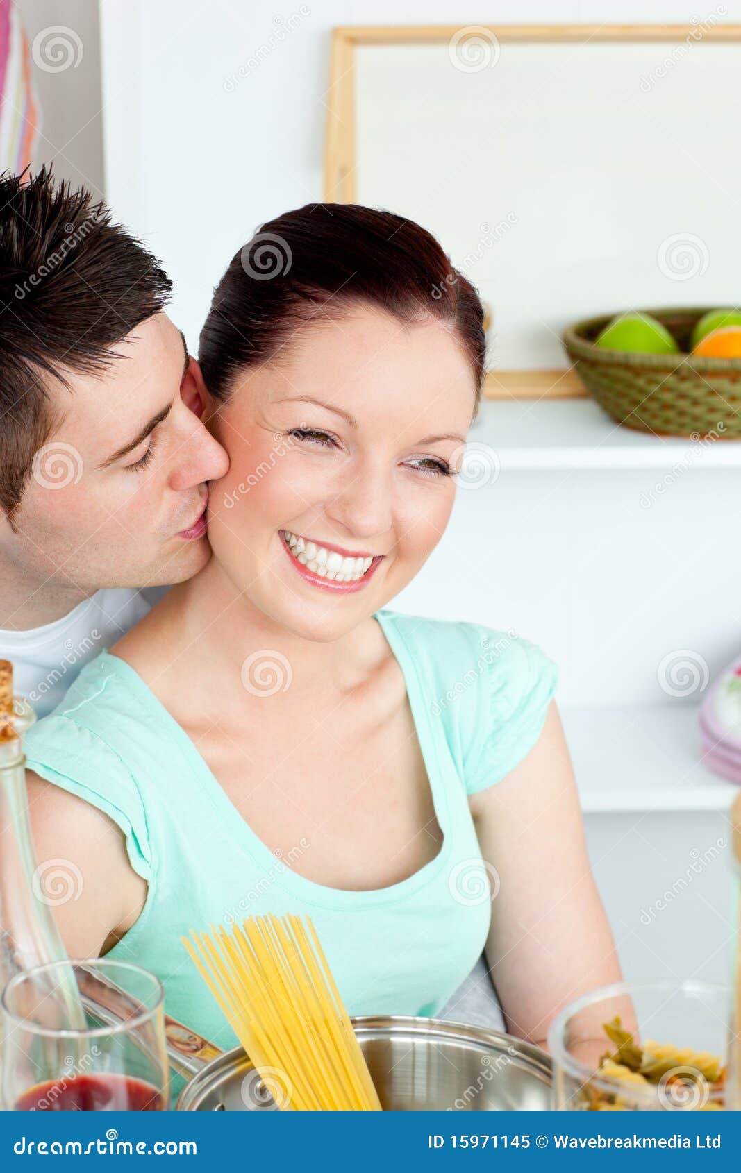 Young Man Kissing His Girlfriend Preparing Pasta Stock Image Image of