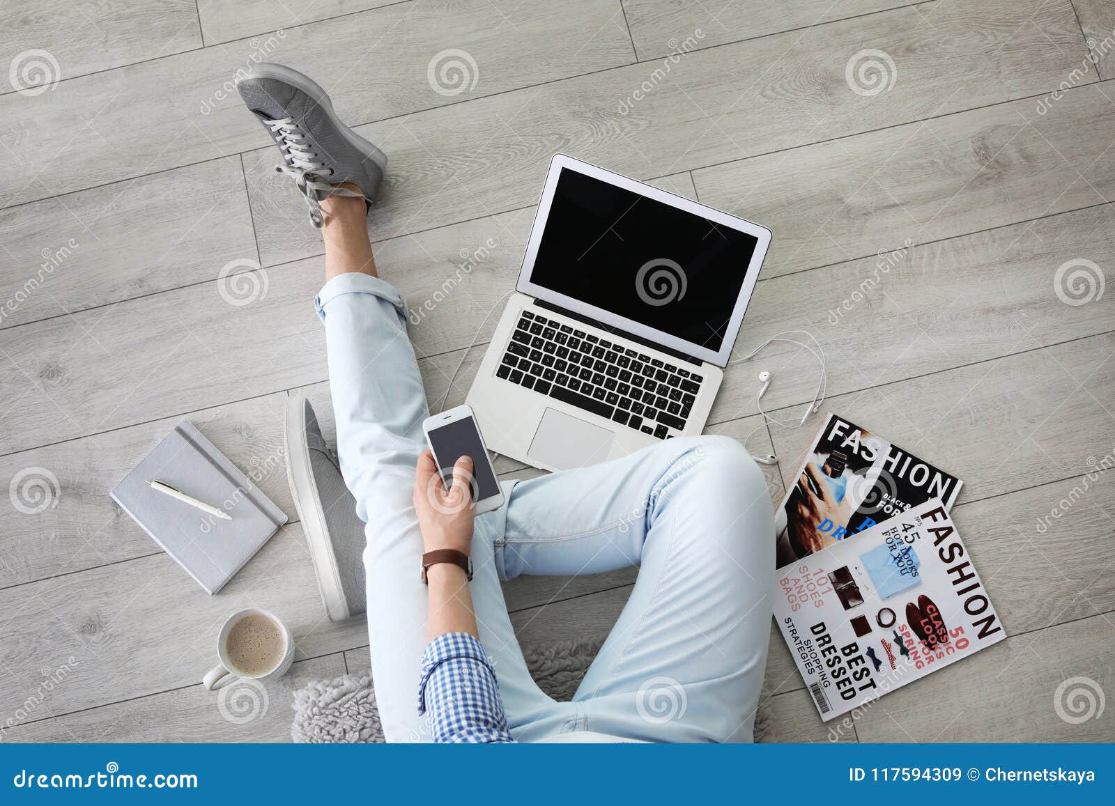 Young Man with Laptop and Mobile Phone Sitting Stock Image - Image of ...