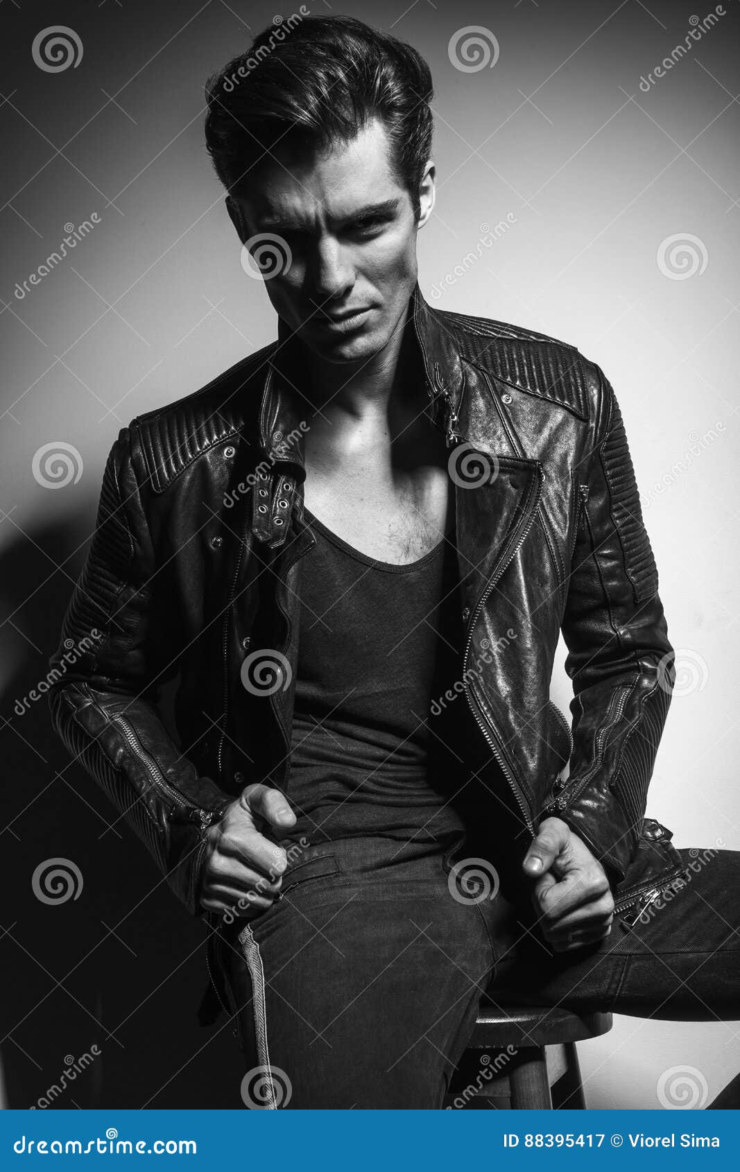 Young Man in Leather Jacket Pulling Collar Stock Image - Image of ...