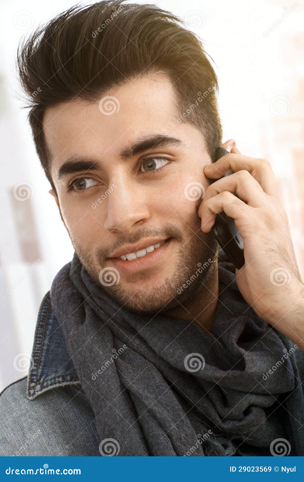 Young man on mobile phone stock image. Image of handsome - 29023569