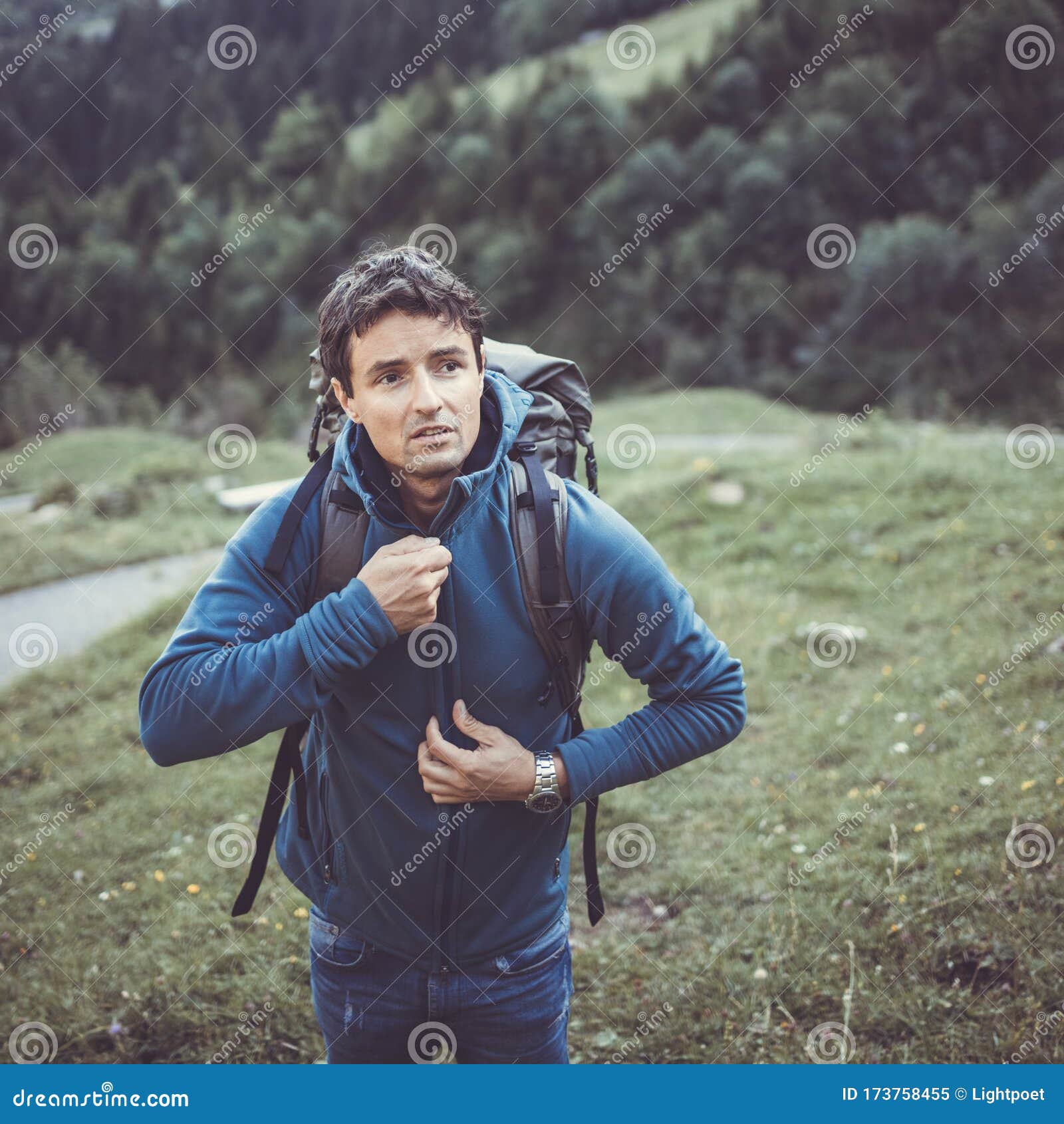 young man in the mountains during an outdoor advernture