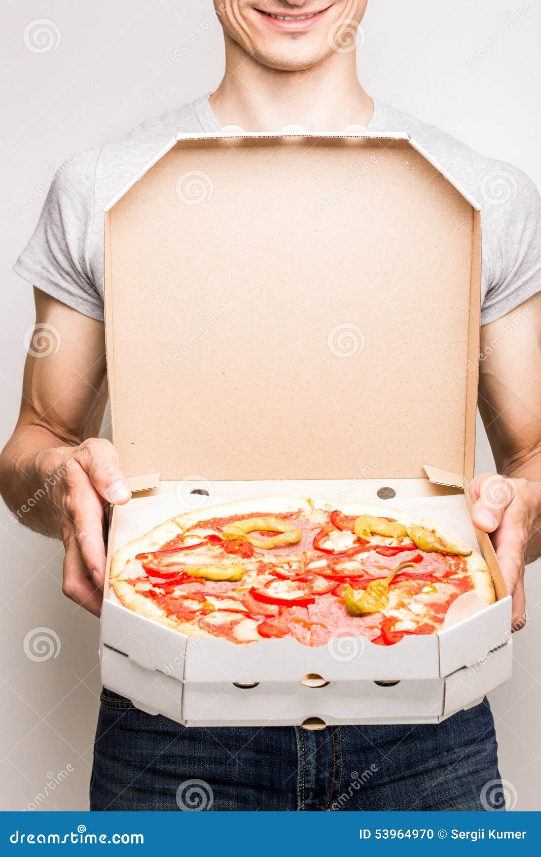 young man offers pizza diabola.