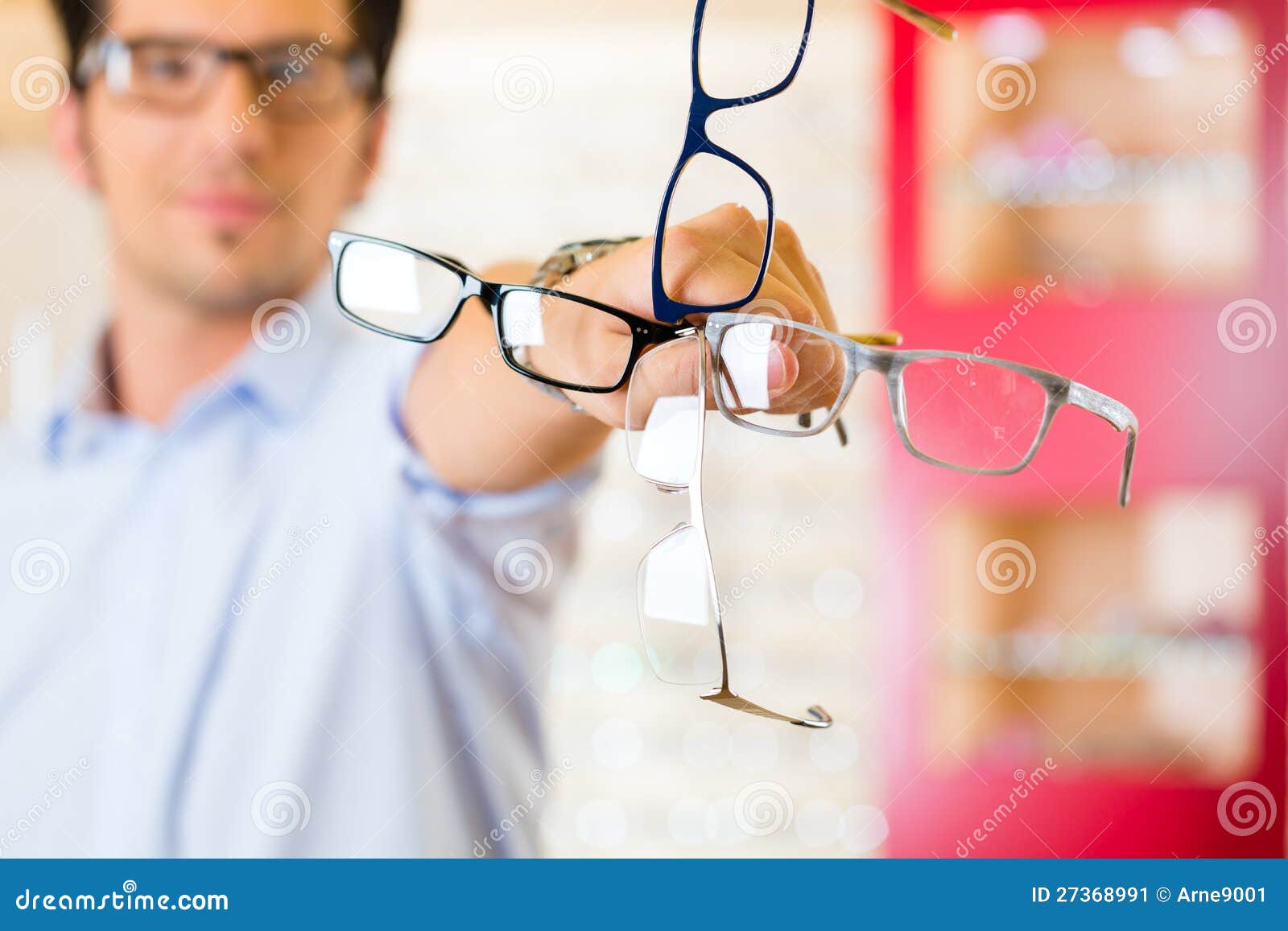 Young Man at Optician with Glasses Stock Image - Image of modern ...