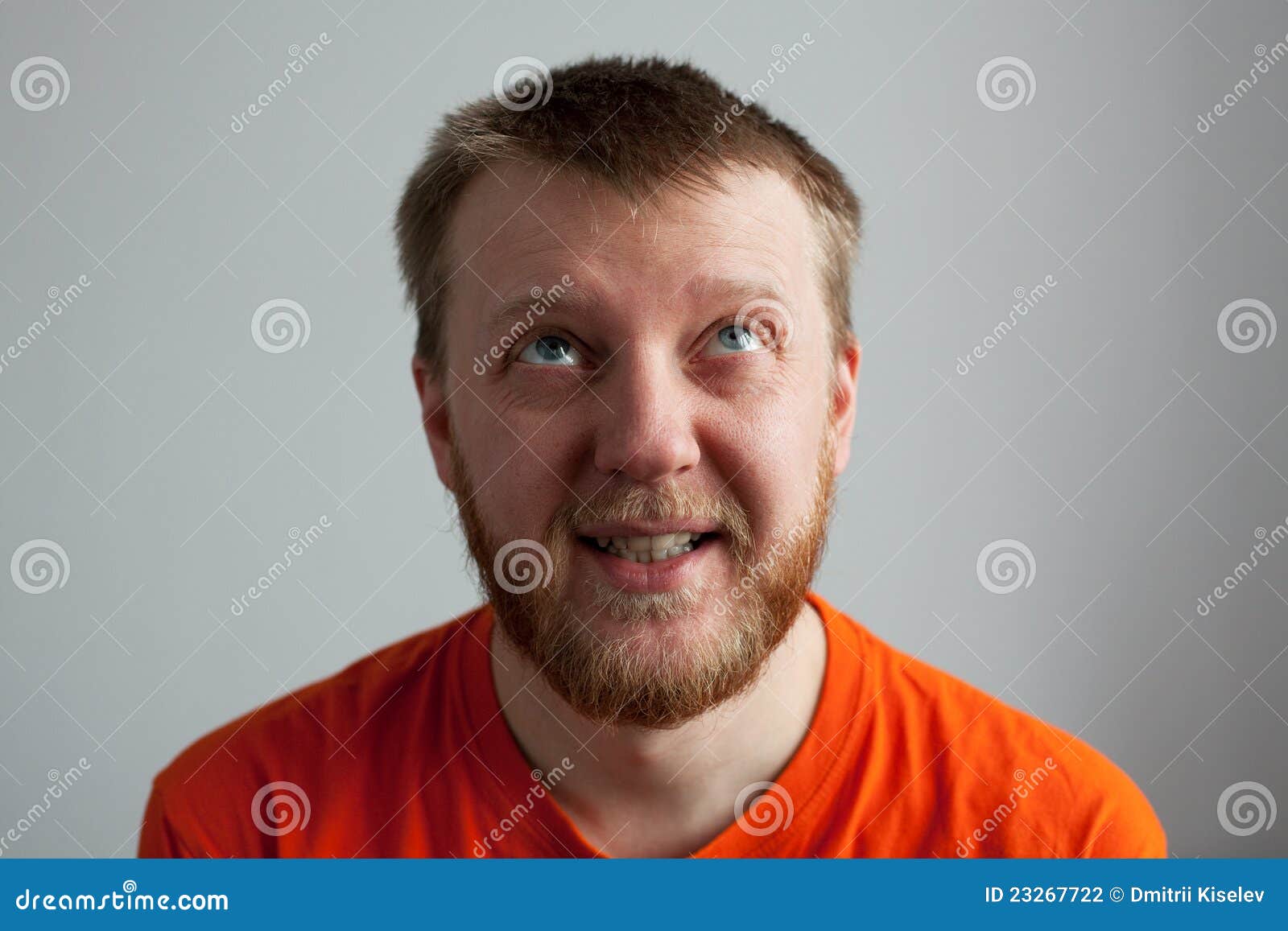 Young Man in an Orange Shirt Stock Photo Image of friendly, brown