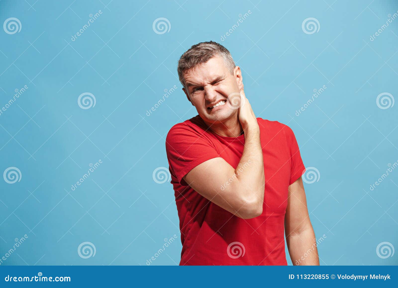 Young Man Overwhelmed with a Pain in the Neck . Stock Image - Image of ...