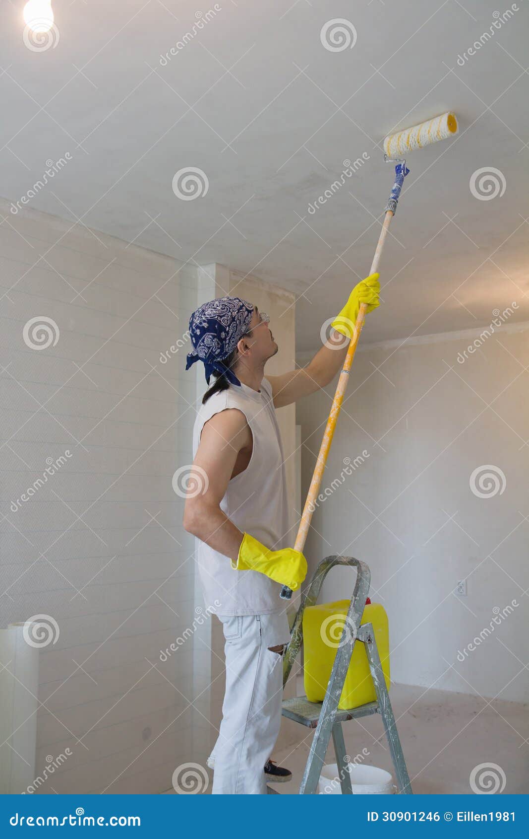 Young Man Painting Ceiling with Painting Roller Stock Photo Image of