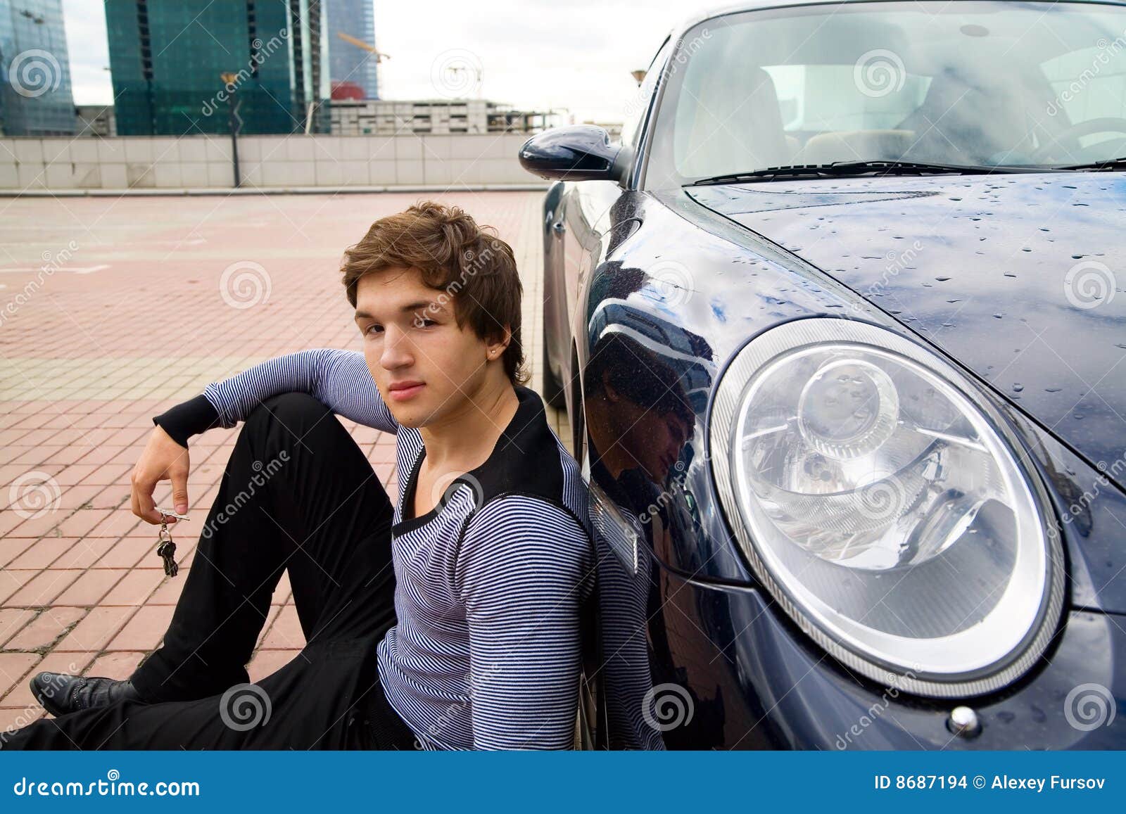 The young man on a parking stock photo. Image of industry 8687194
