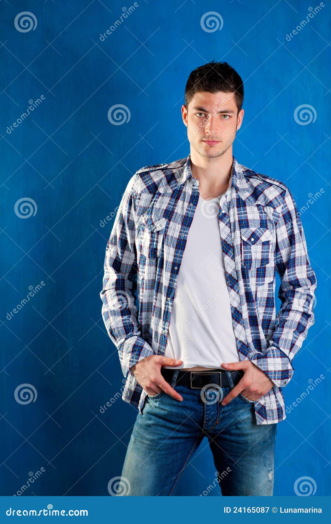 Young Man with Plaid Shirt Denim Jeans in Blue Stock Image - Image of