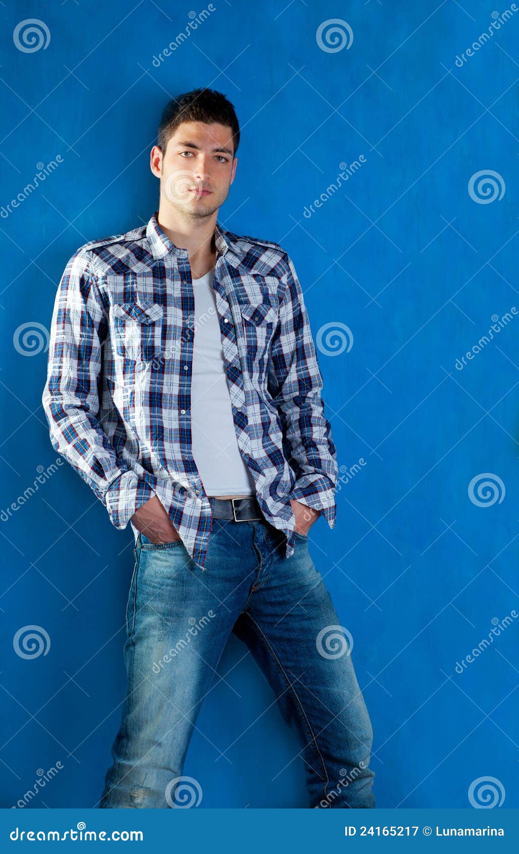 Young Man with Plaid Shirt Denim Jeans in Blue Stock Image - Image of