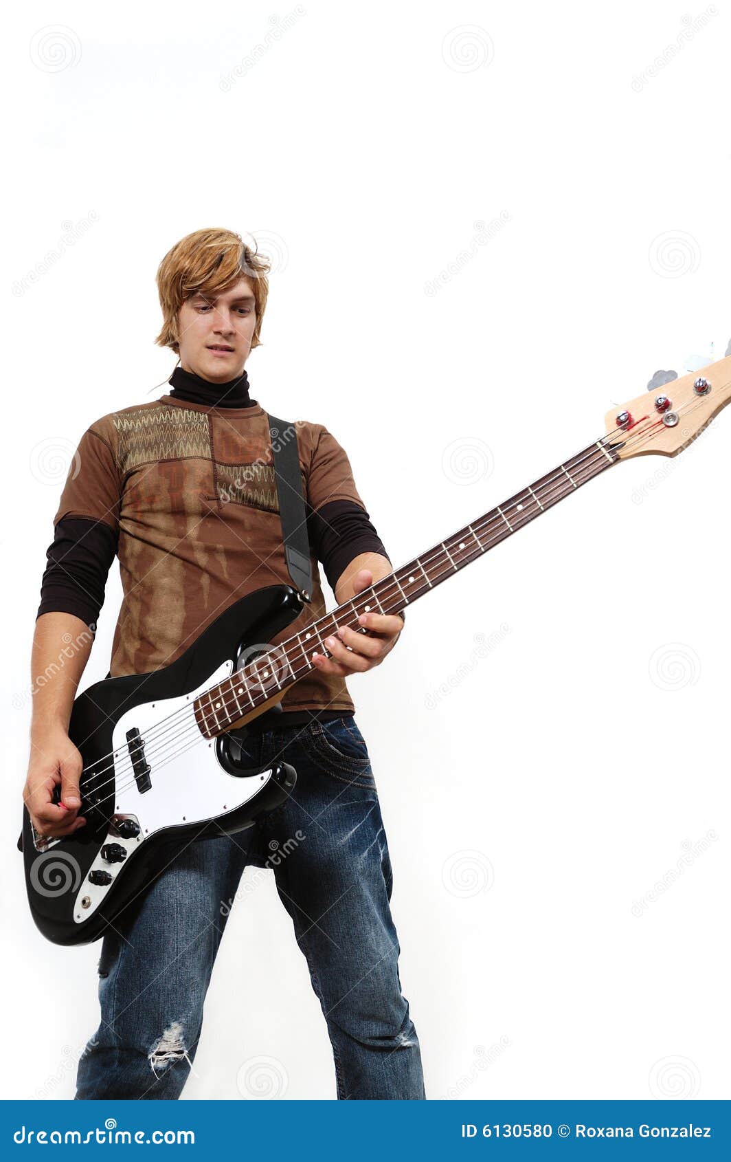 Young Man Playing Bass Guitar Stock Photo - Image of male, enjoying: 6130580