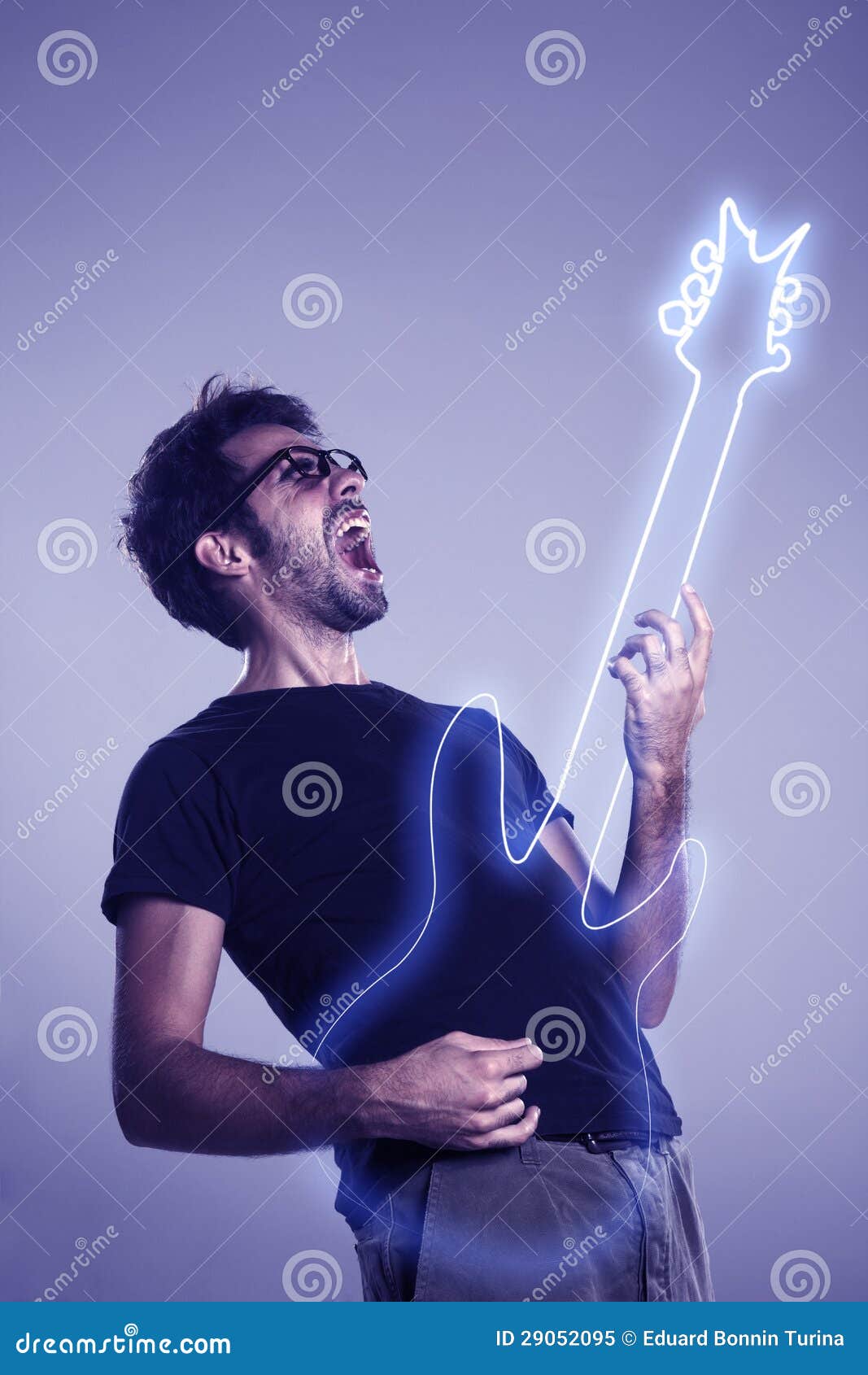 Young Man Playing Imaginary Guitar and Squealing Stock Image Image of