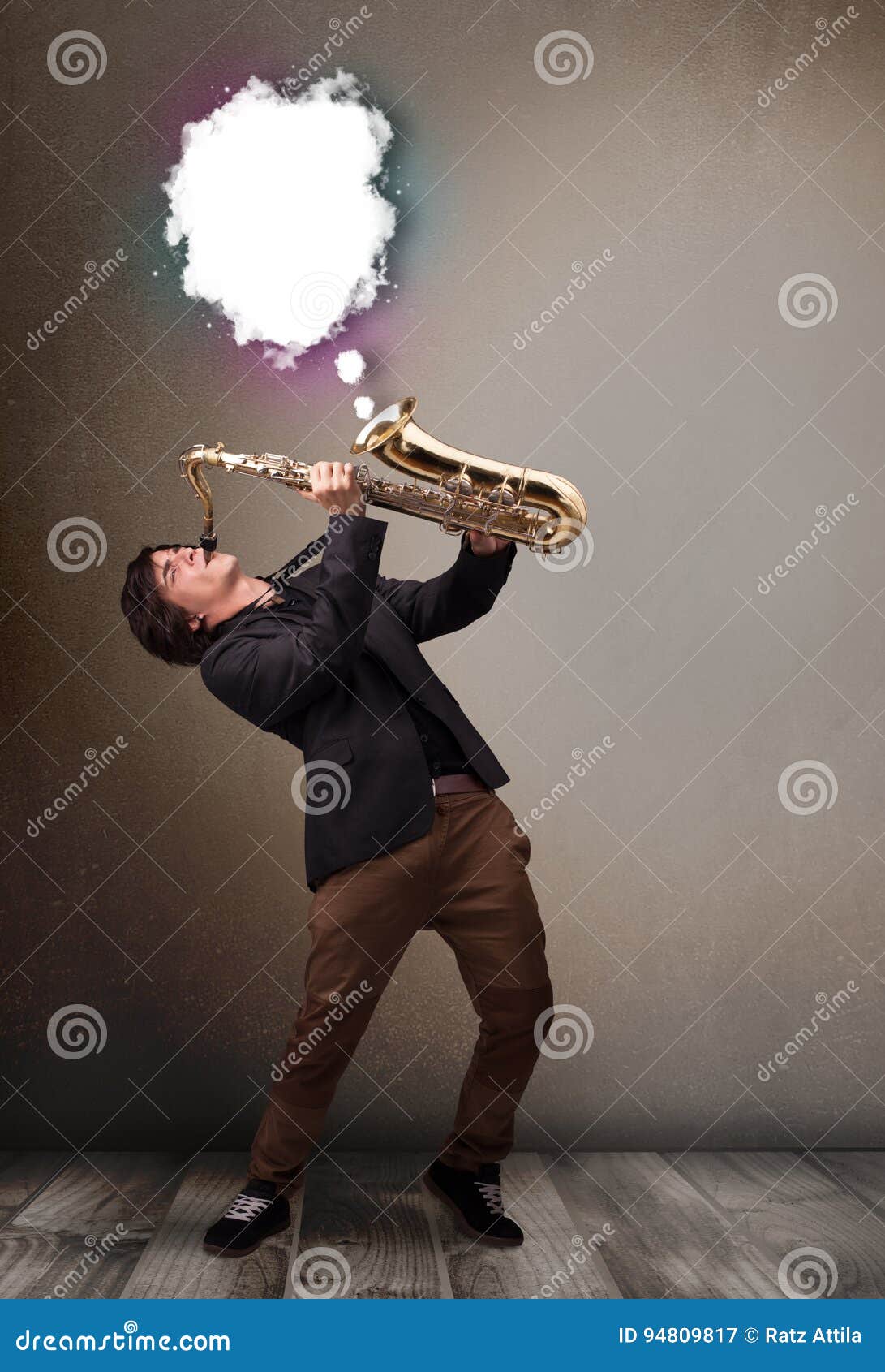 Young Man Playing on Saxophone with Copy Space in White Cloud Stock