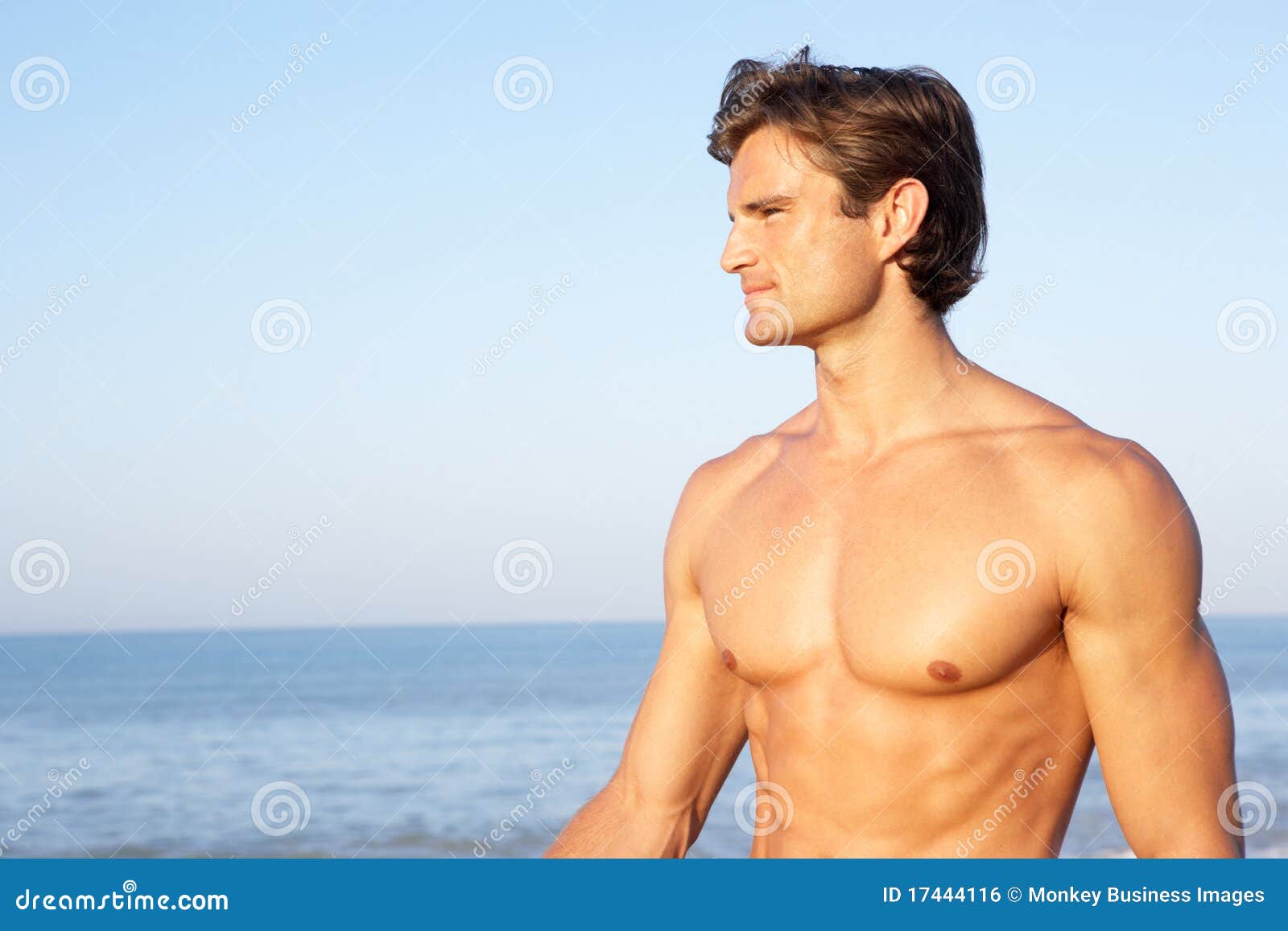 Attractive Man Of Model Appearance Posing On Tropical Beach Stock Photo,  Picture and Royalty Free Image. Image 153187081.