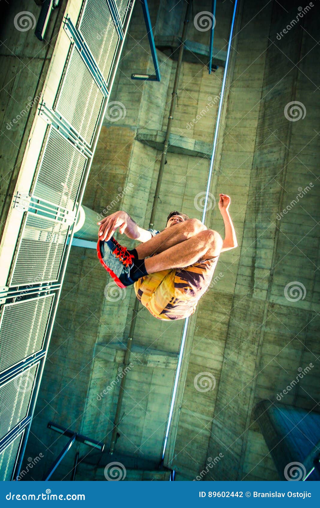 Young Man Practice Parkour Jump In The City Stock Photo Image Of