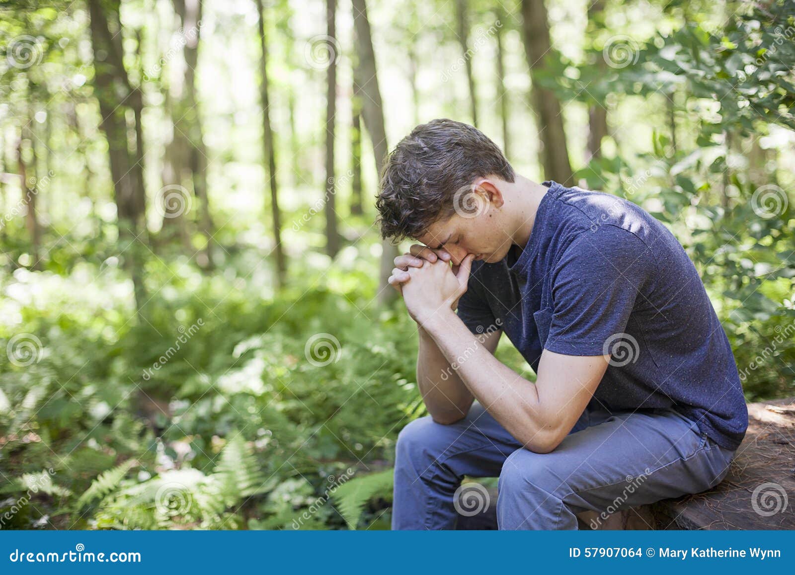 young man in prayer