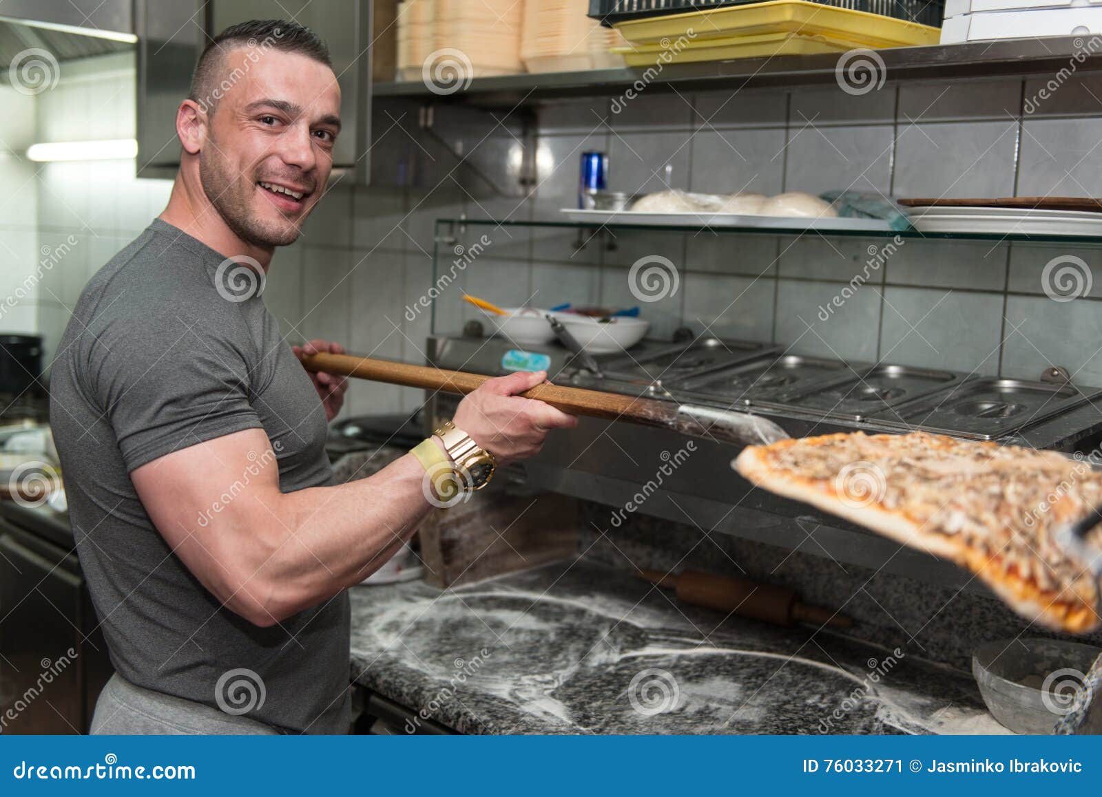 Young Man Putting Pizza Into The Oven Stock Image Image Of Caucasian