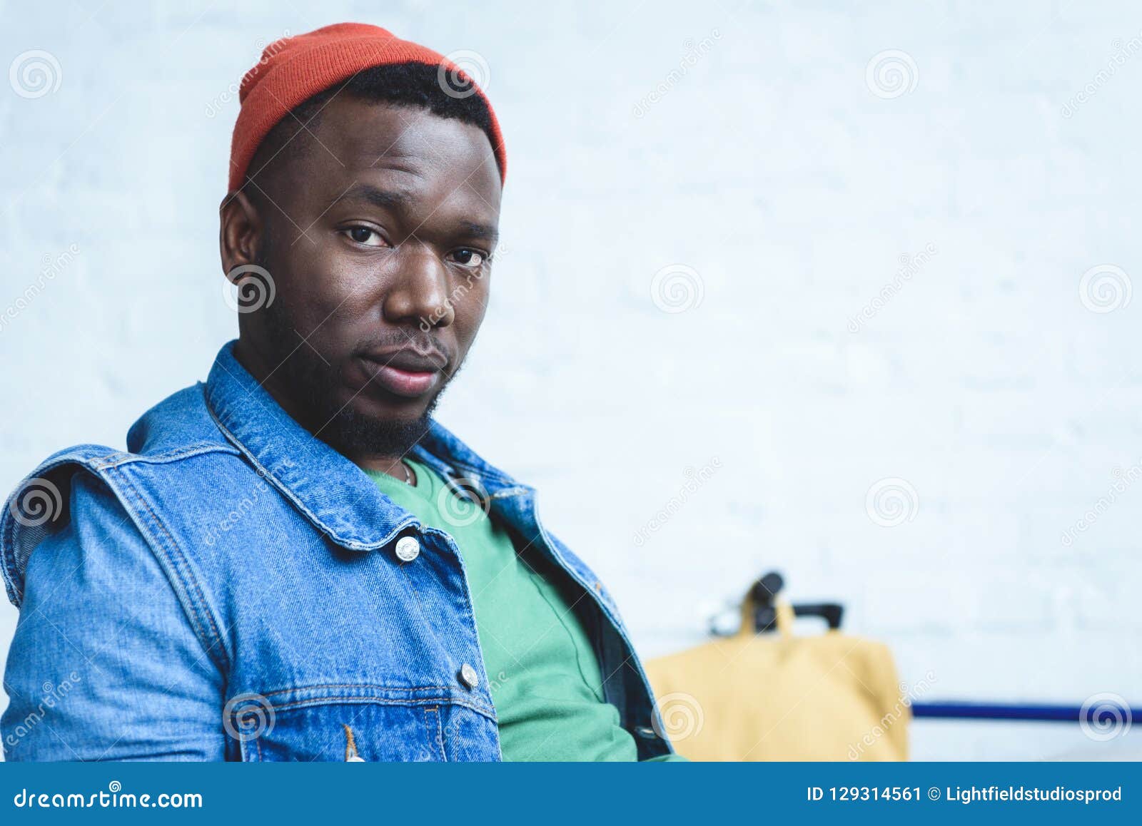 Young man in red hat stock image. Image of youngadult 129314561