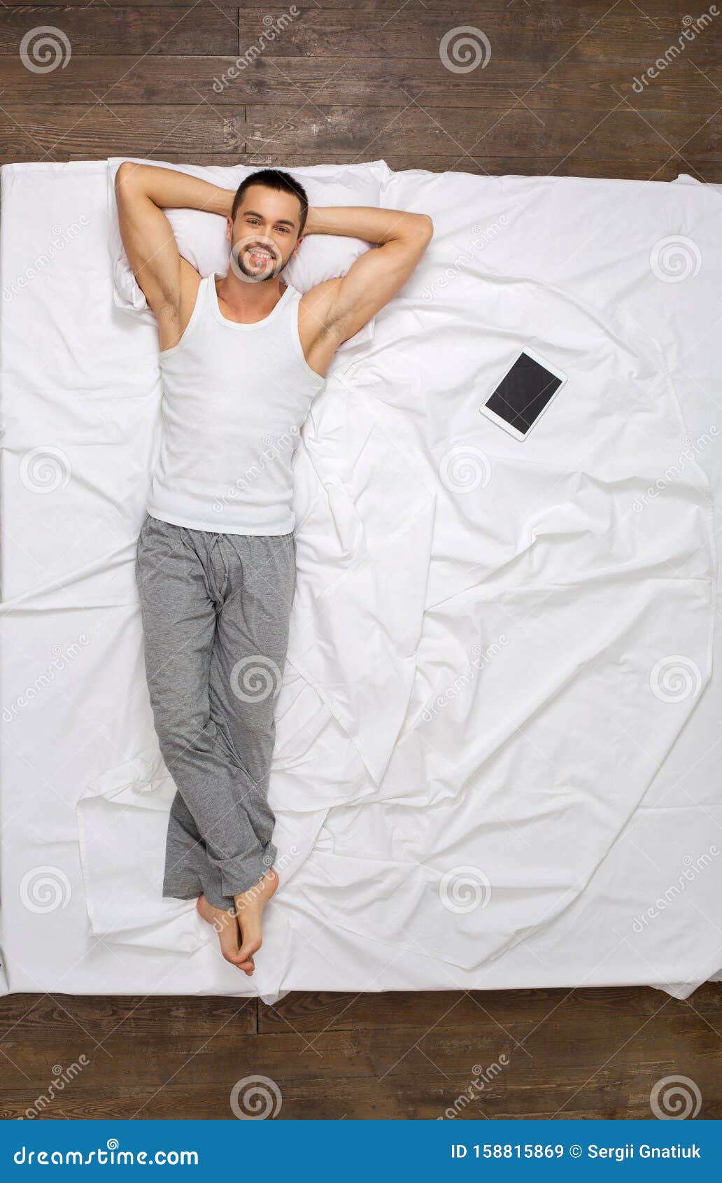 Young Man Relaxation On The Bed Top View Laying Stock Image Image Of