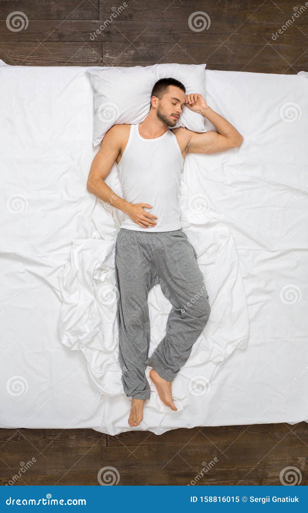 Young Man Relaxation on the Bed Top View Sleeping Stock Image - Image ...