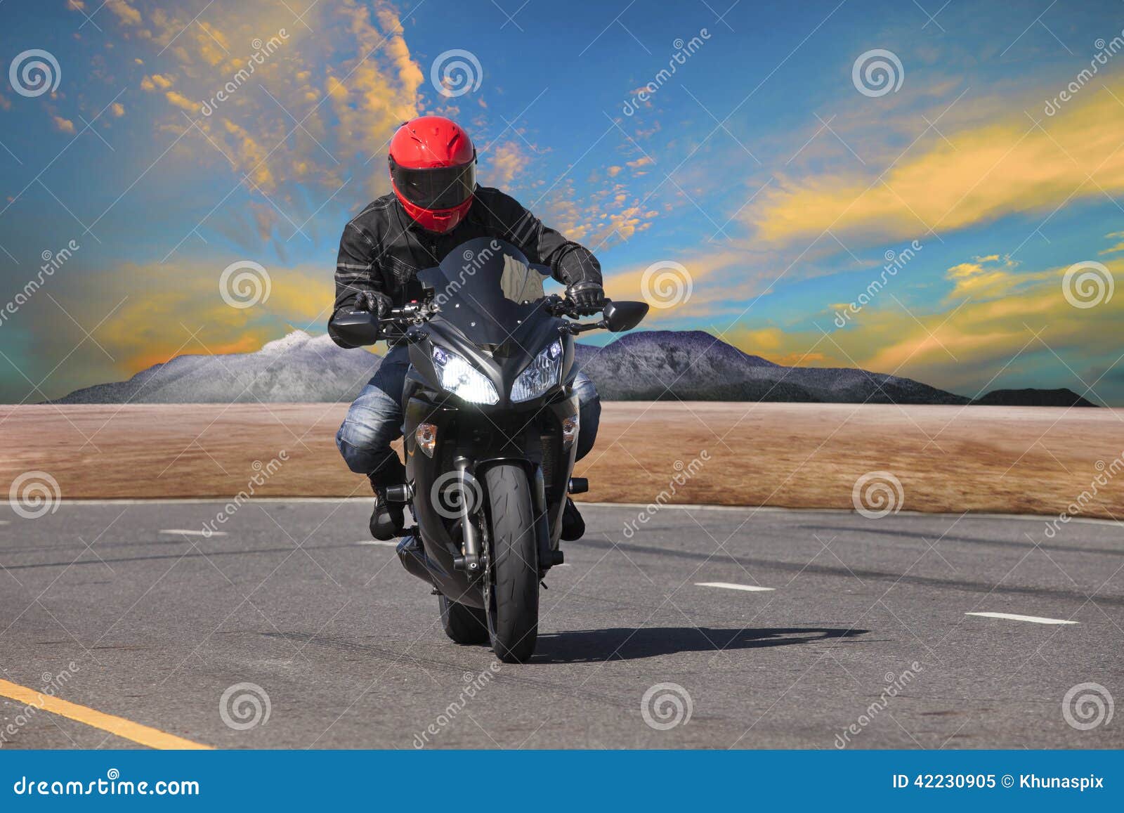Young Man Riding Motorcycle In Asphalt Road Curve Use For Extrem Stock