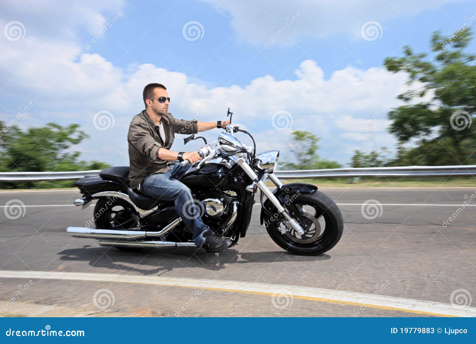 Young Man Riding A Motorcycle On An Open Road Stock Image ...