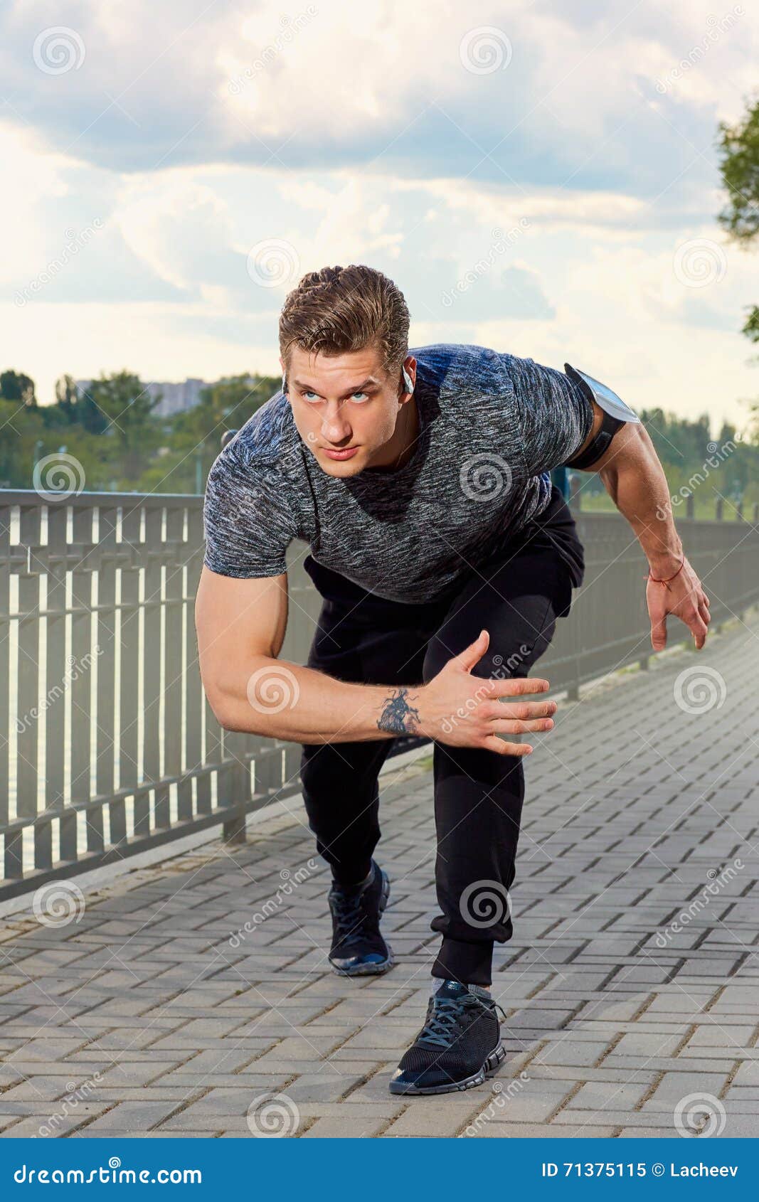 Young Man Running in the Park Alone at Sunset. Stock Image - Image of ...