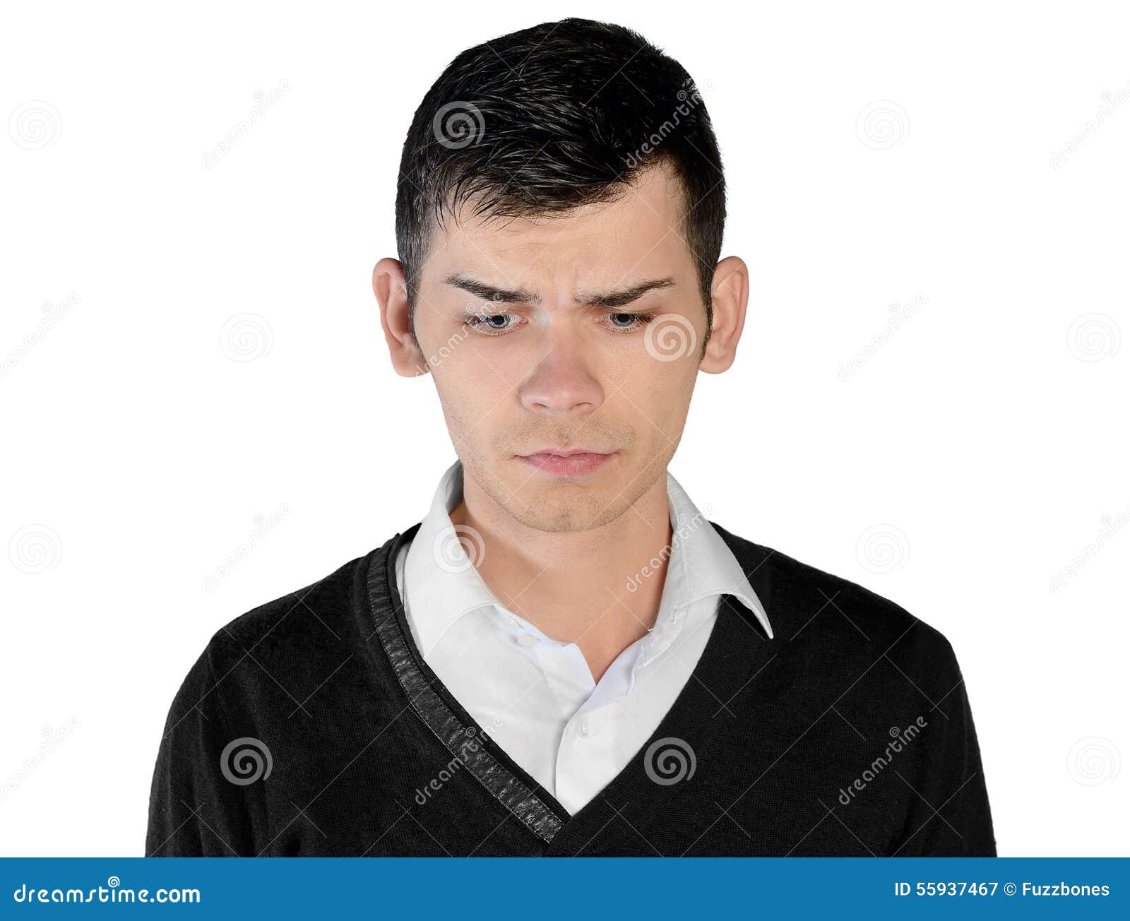 Profile view of sad young man looking down Stock Photo - Alamy